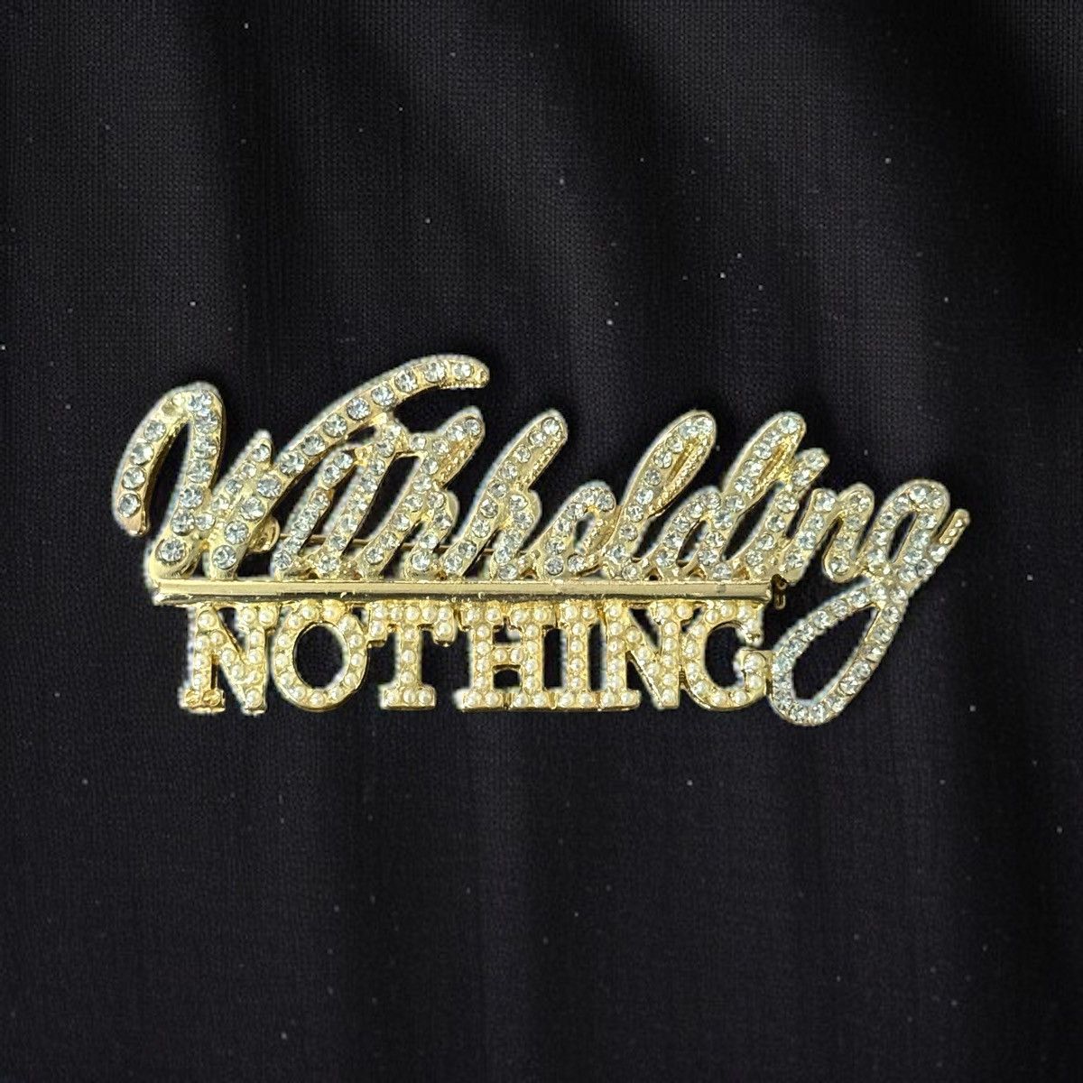 Other Gold tone iced Witholding Nothing pin Size ONE SIZE - 1 Thumbnail