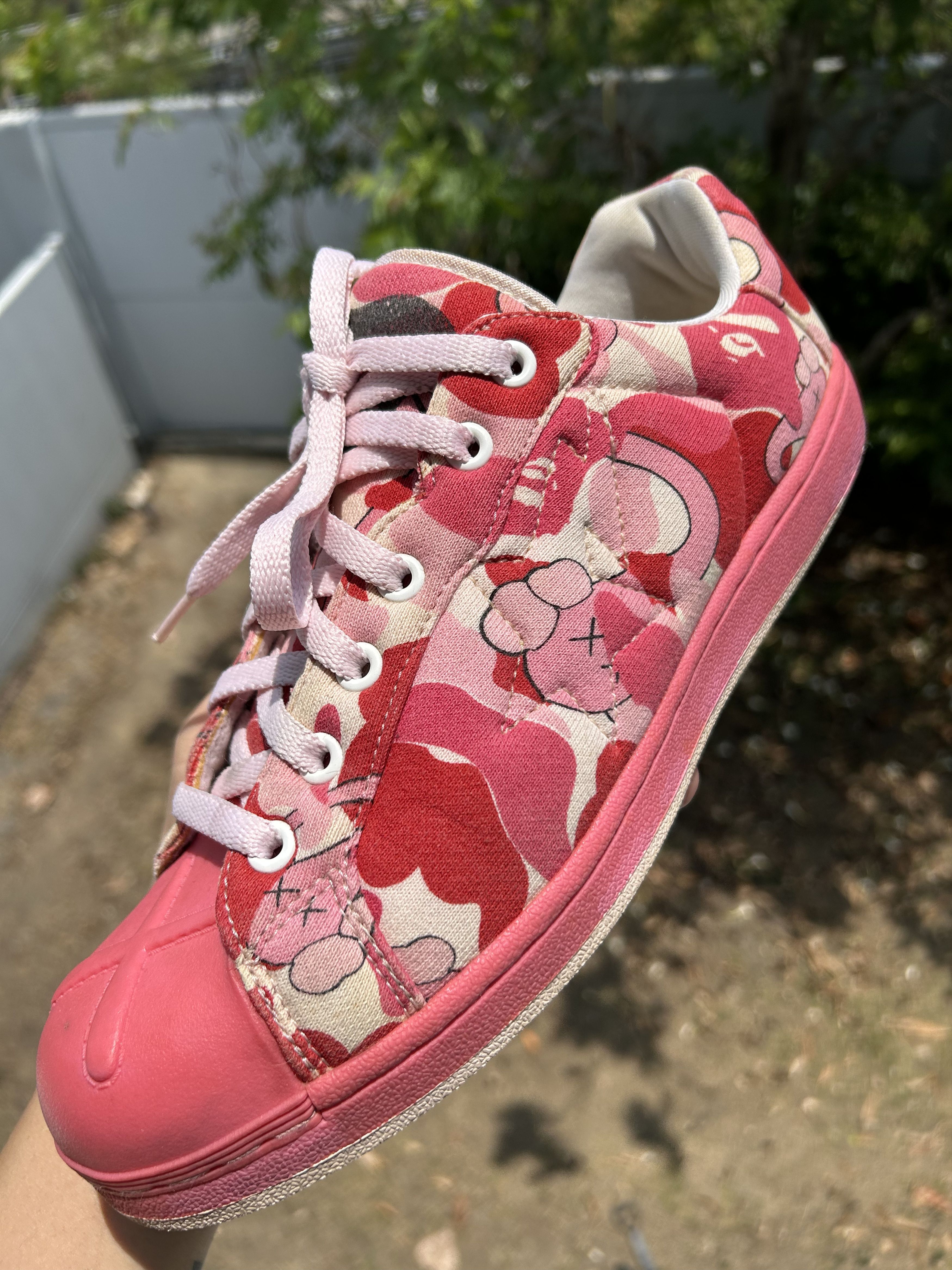 Bape × Kaws A Bathing Ape Skull Sta KAWS Pink Camo [11 US] Size US 11 / EU 44 - 1 Thumbnail