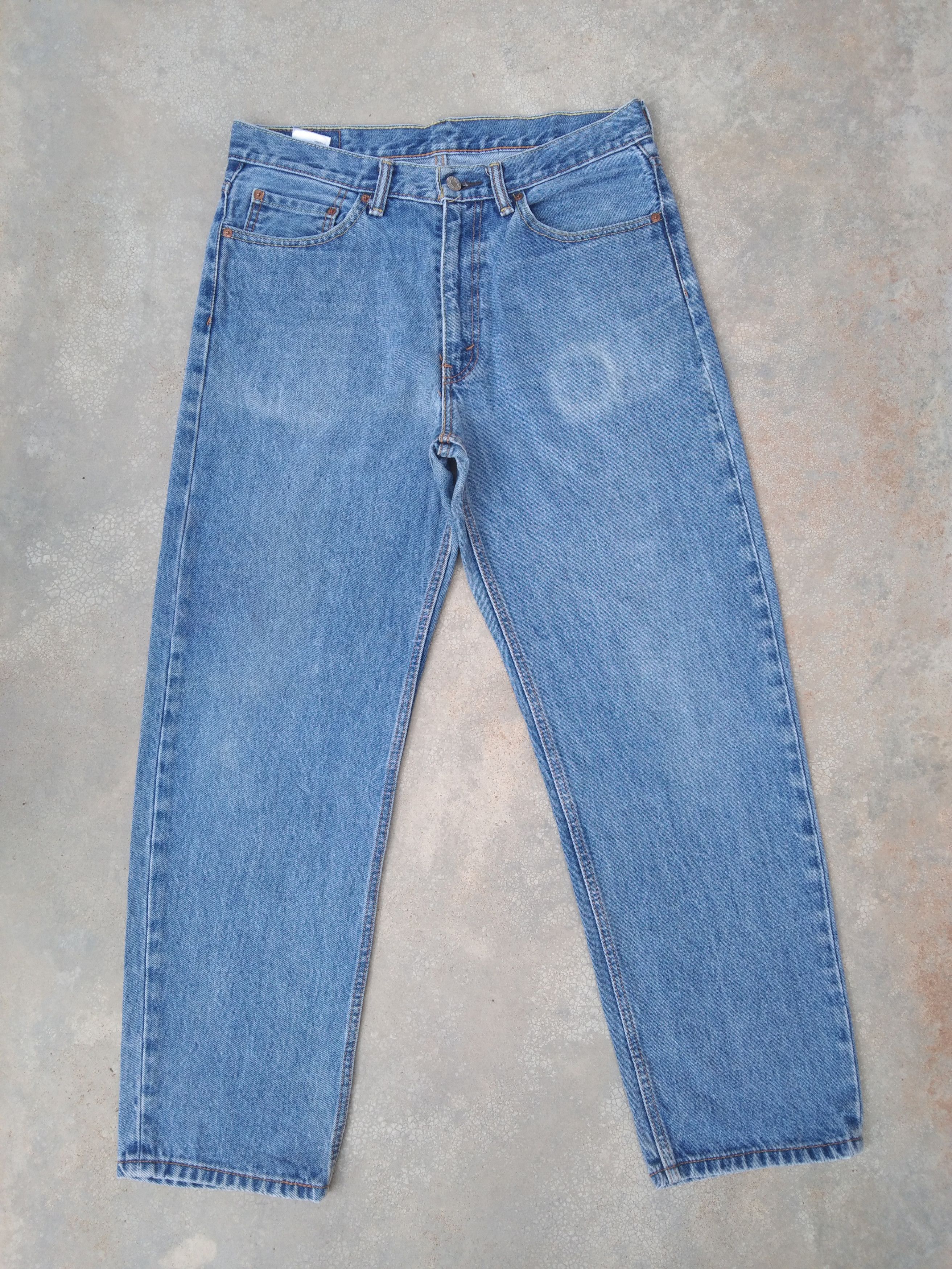 Levi's Vintage Levi's Jeans 550 Light Blue Denim 33x30 Size US 33 - 1 Thumbnail