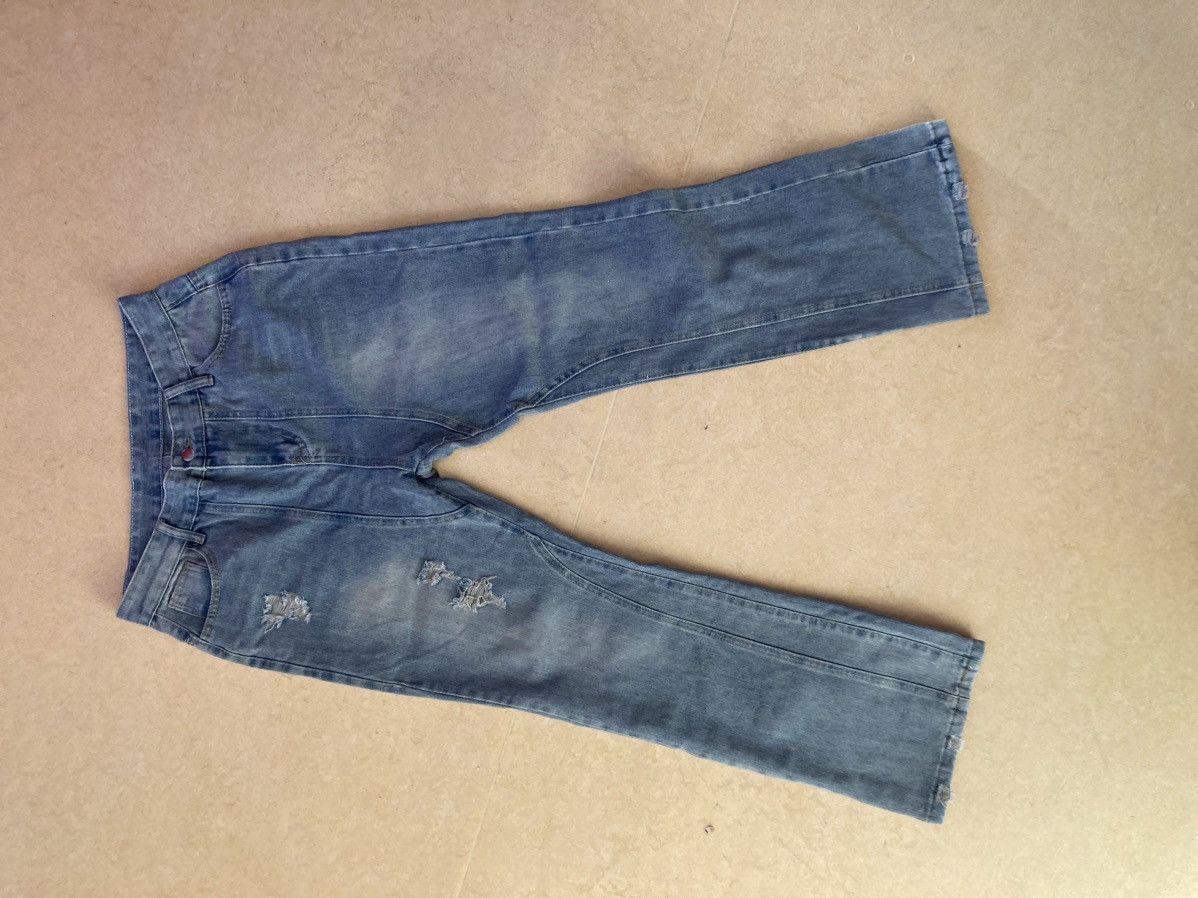 Vintage Blue ripped denims Size US 33 - 1 Thumbnail