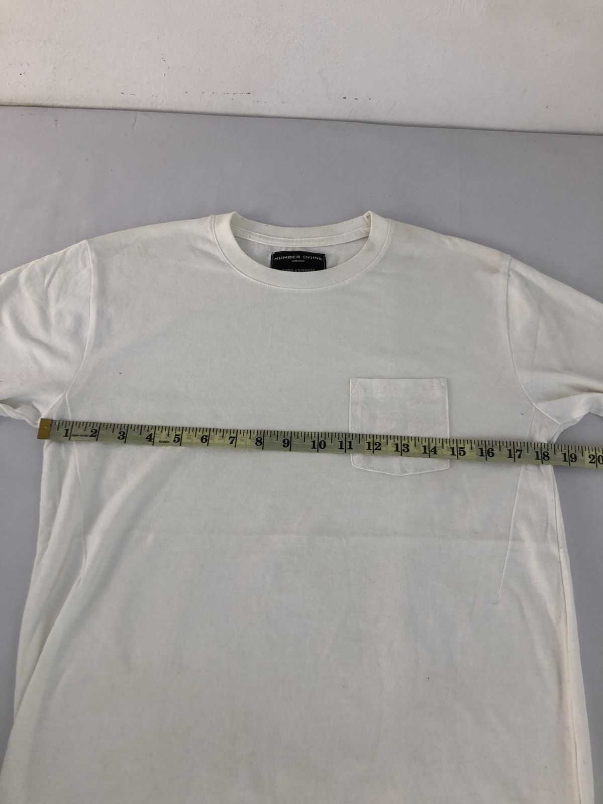 NANO universe × Number (N)ine Hype Number (N)ine Nano Universe Minimalist Single Pocket T Size US S / EU 44-46 / 1 - 7 Thumbnail
