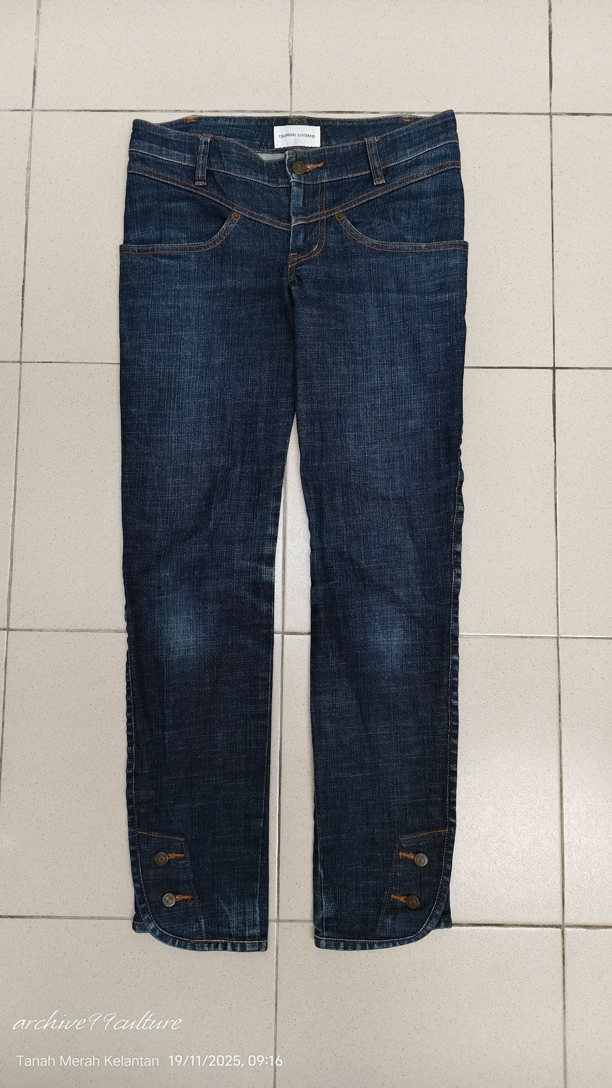 Tsumori Chisato Dark wash jeans with a lowrise fit and buttoned ankle cuffs Size 29" - 1 Thumbnail