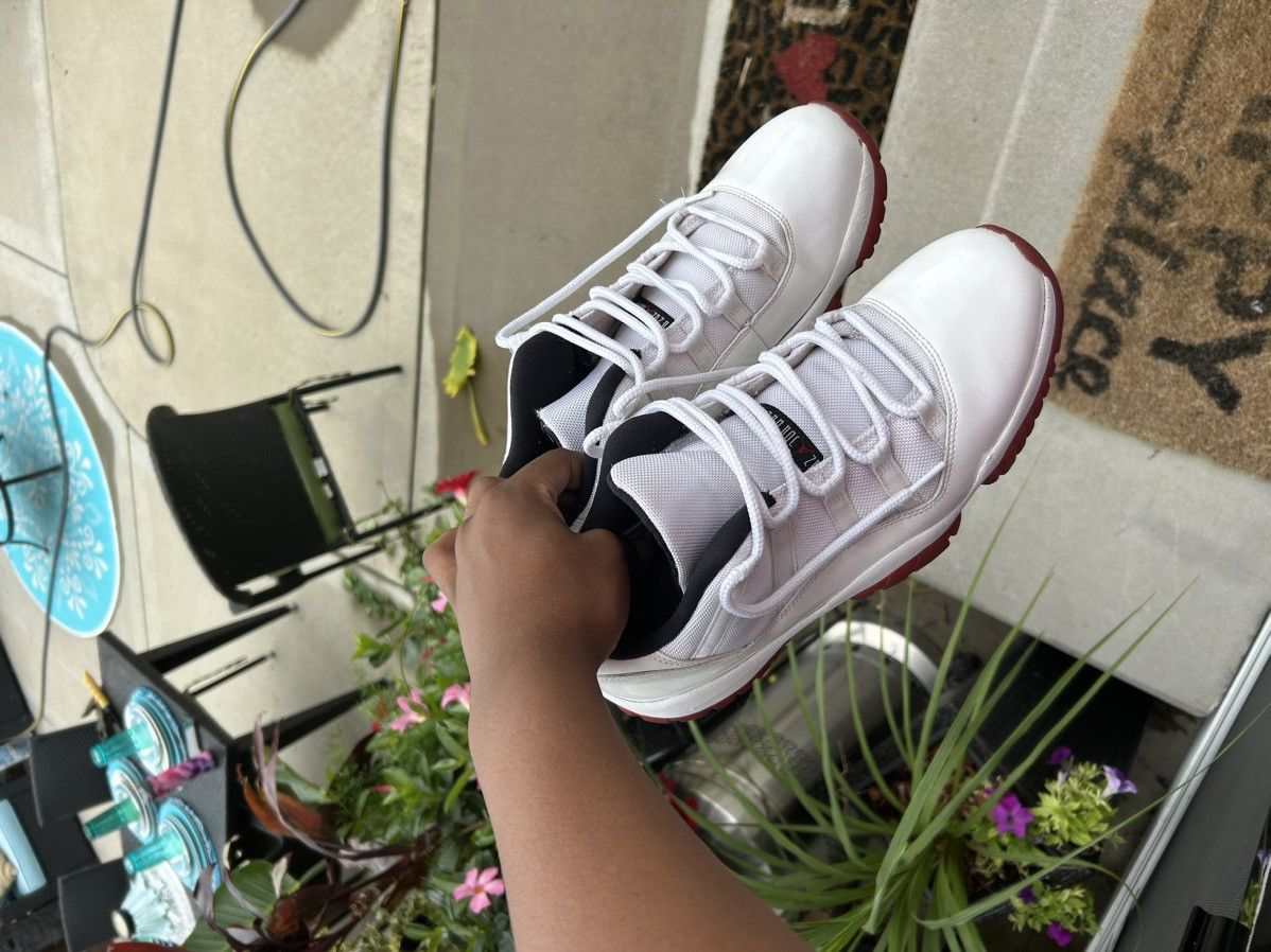 image of Air Jordan 11 Retro Low ‘Cherry Bottom’ Shoes in White, Men's (Size 13)