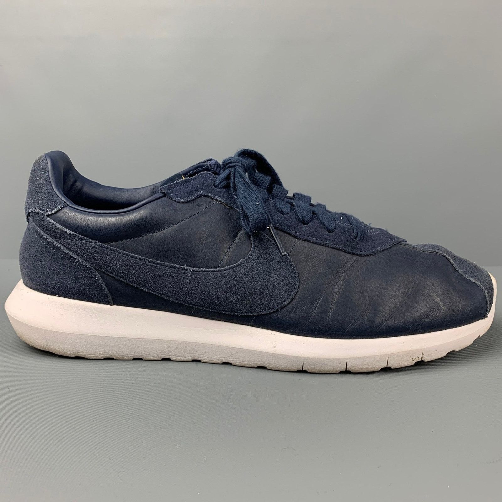 Nike NIKE Size 12 Navy Leather Low Top Sneakers Size US 12 / EU 45 - 1 Thumbnail