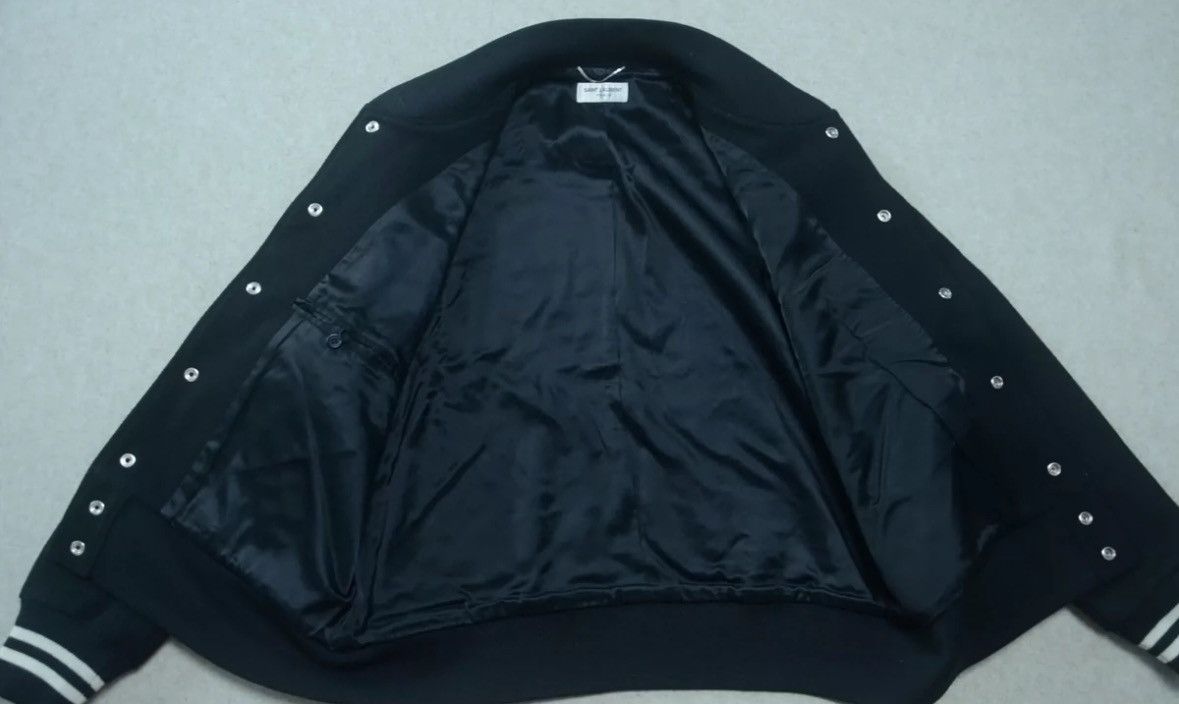 Saint Laurent Paris × Yves Saint Laurent Saint Laurent black and white wool patchwork baseball jacket Size US XL / EU 56 / 4 - 7 Thumbnail