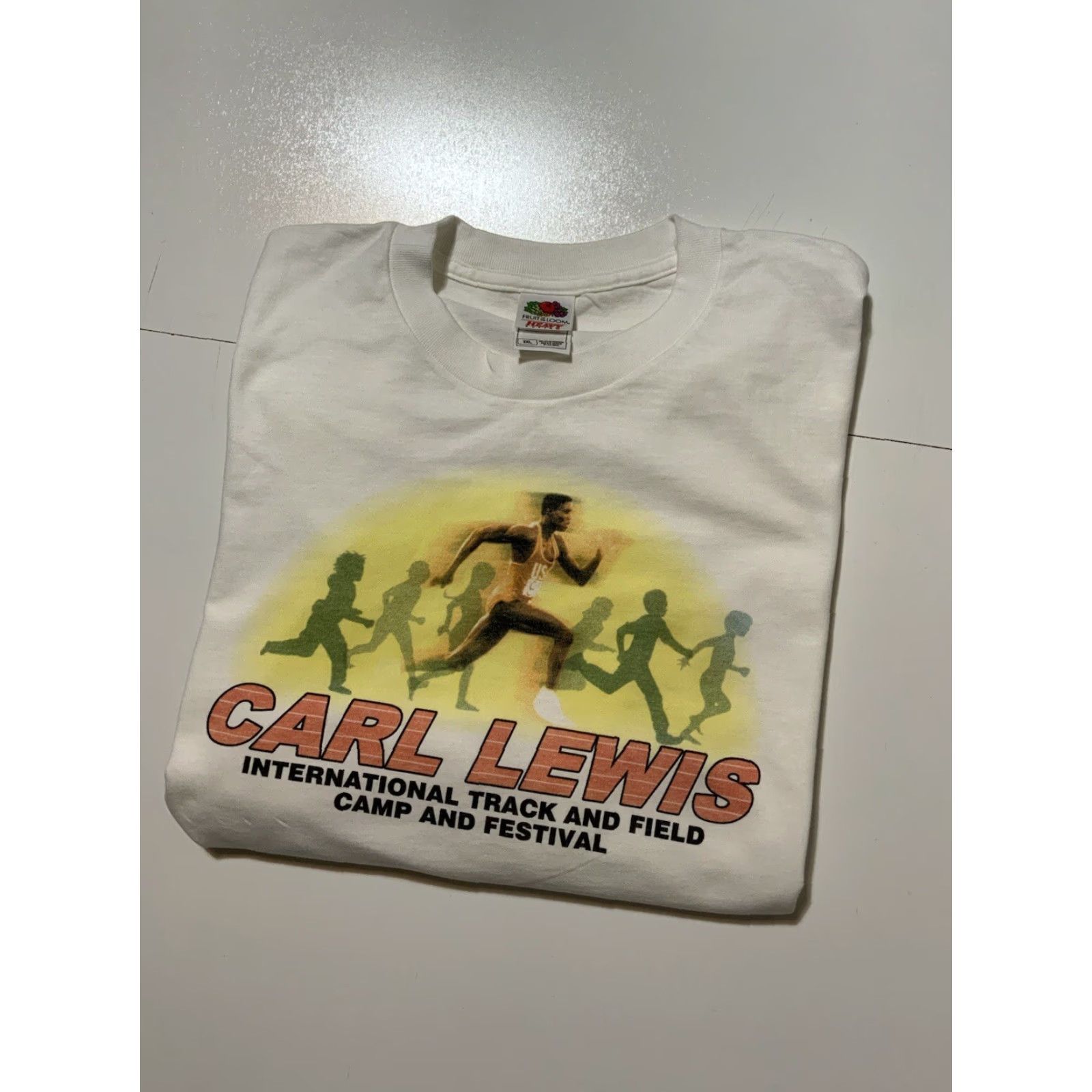 Fruit Of The Loom VINTAGE Carl Lewis International Track & Field Camp Festival Graphic T-Shirt 2XL Mens White Fruit of the Loom shirts? Size US XXL / EU 58 / 5 - 2 Thumbnail