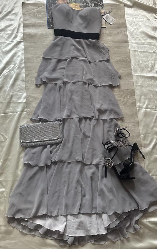 very beautiful dress with a train and cups
