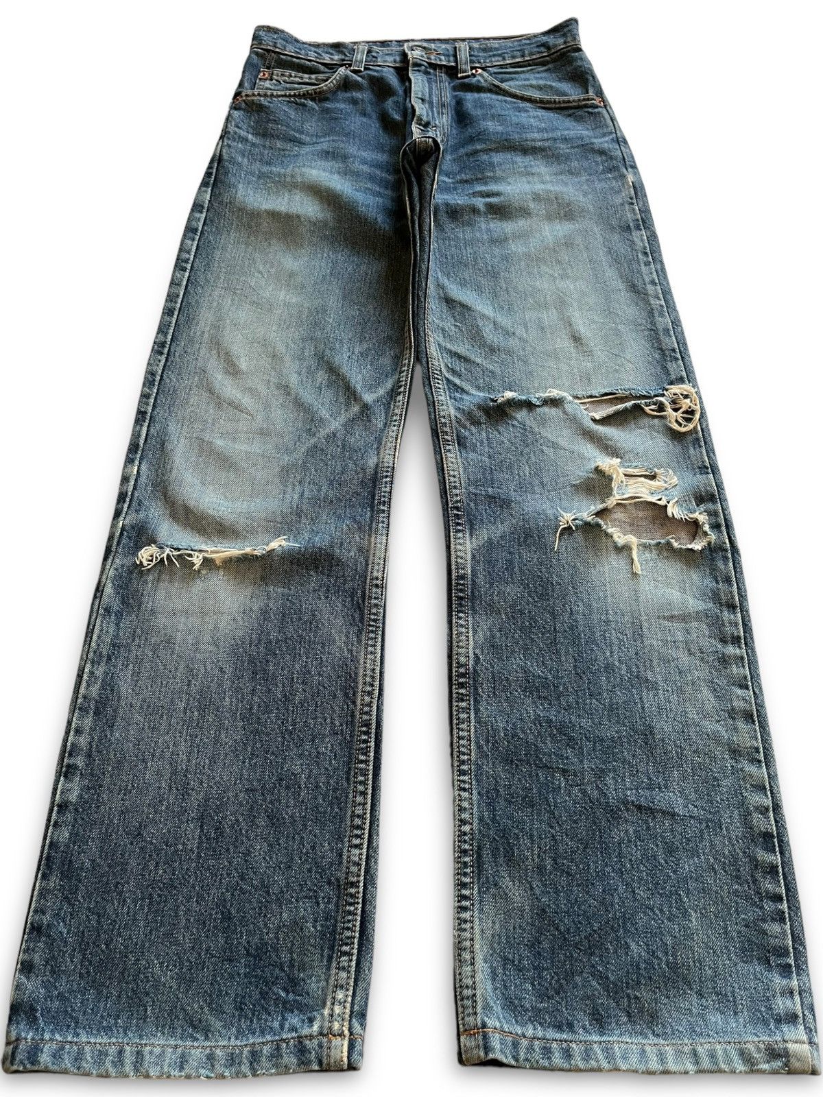 image of Distressed Denim x Levis Vintage 90's Levis 607 Orange Tab Distressed Loose Jeans in Blue (Size 28)