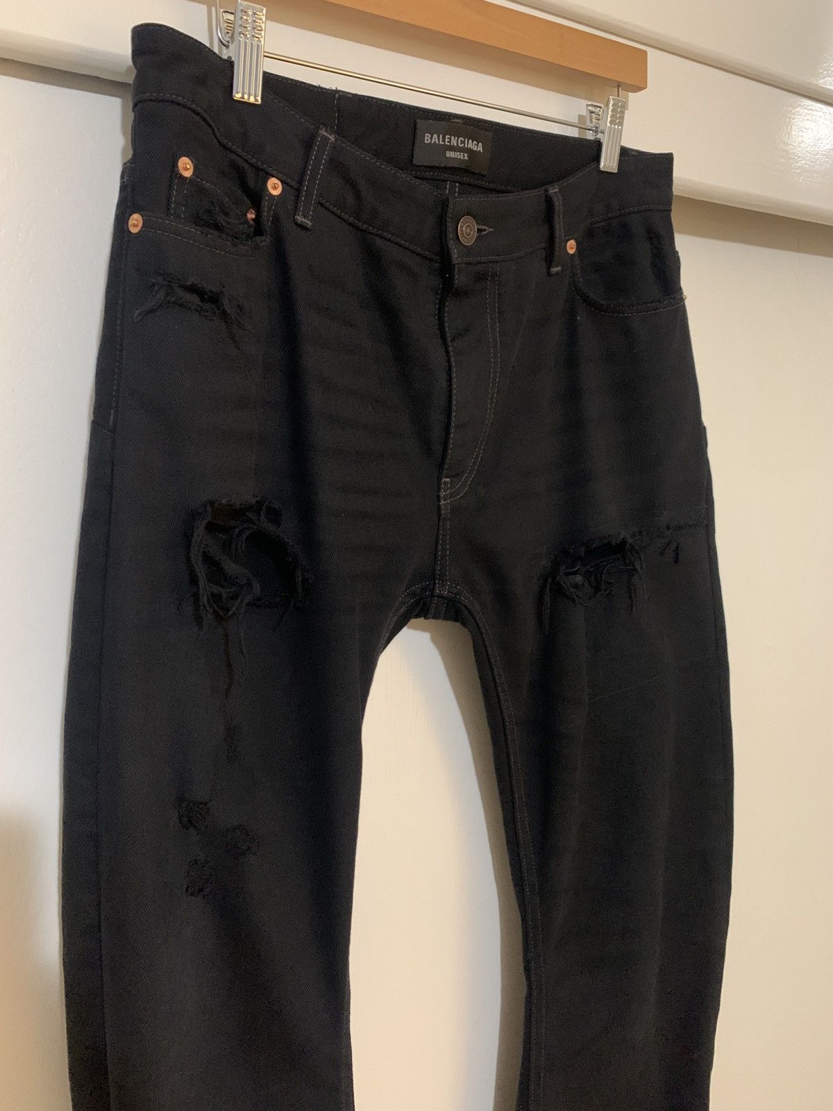 image of Balenciaga Distressed Flared Denim in Black, Men's (Size 34)