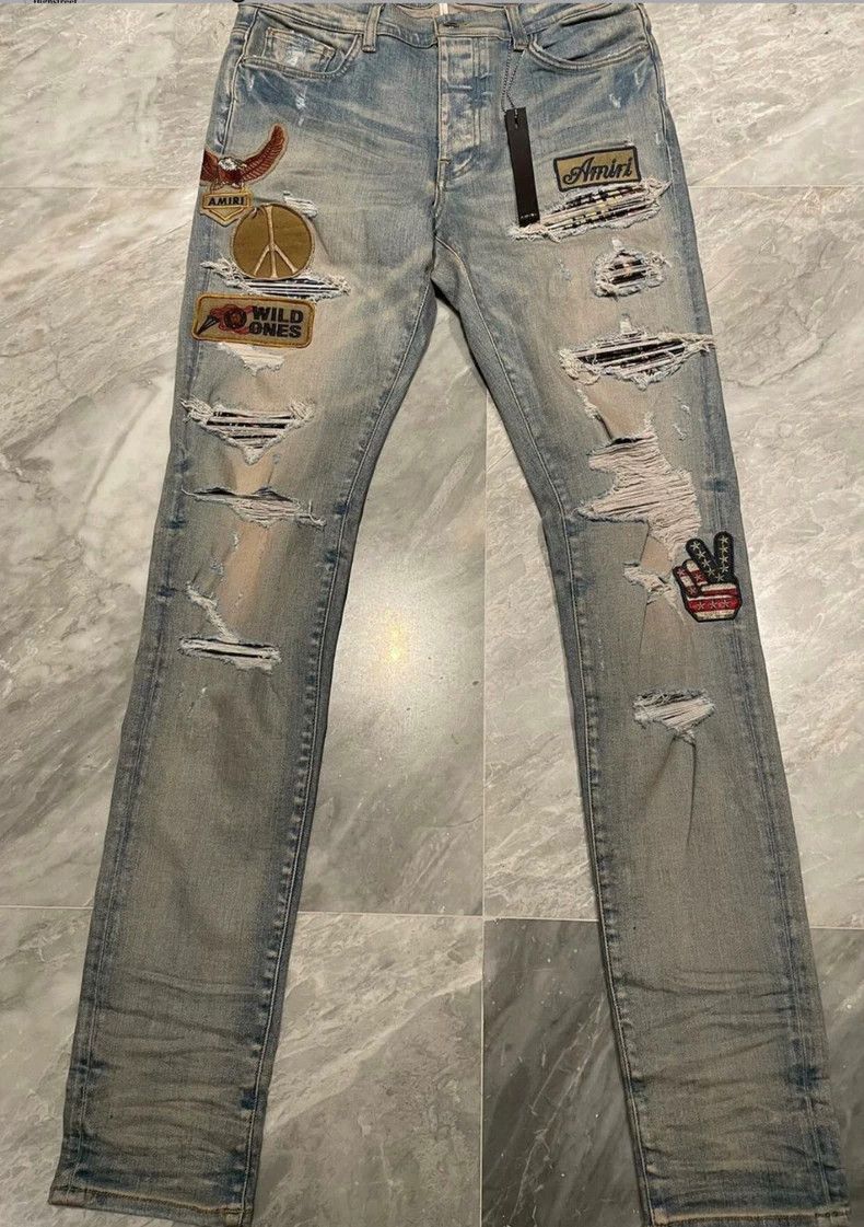 Amiri badge spliced blue denim pants