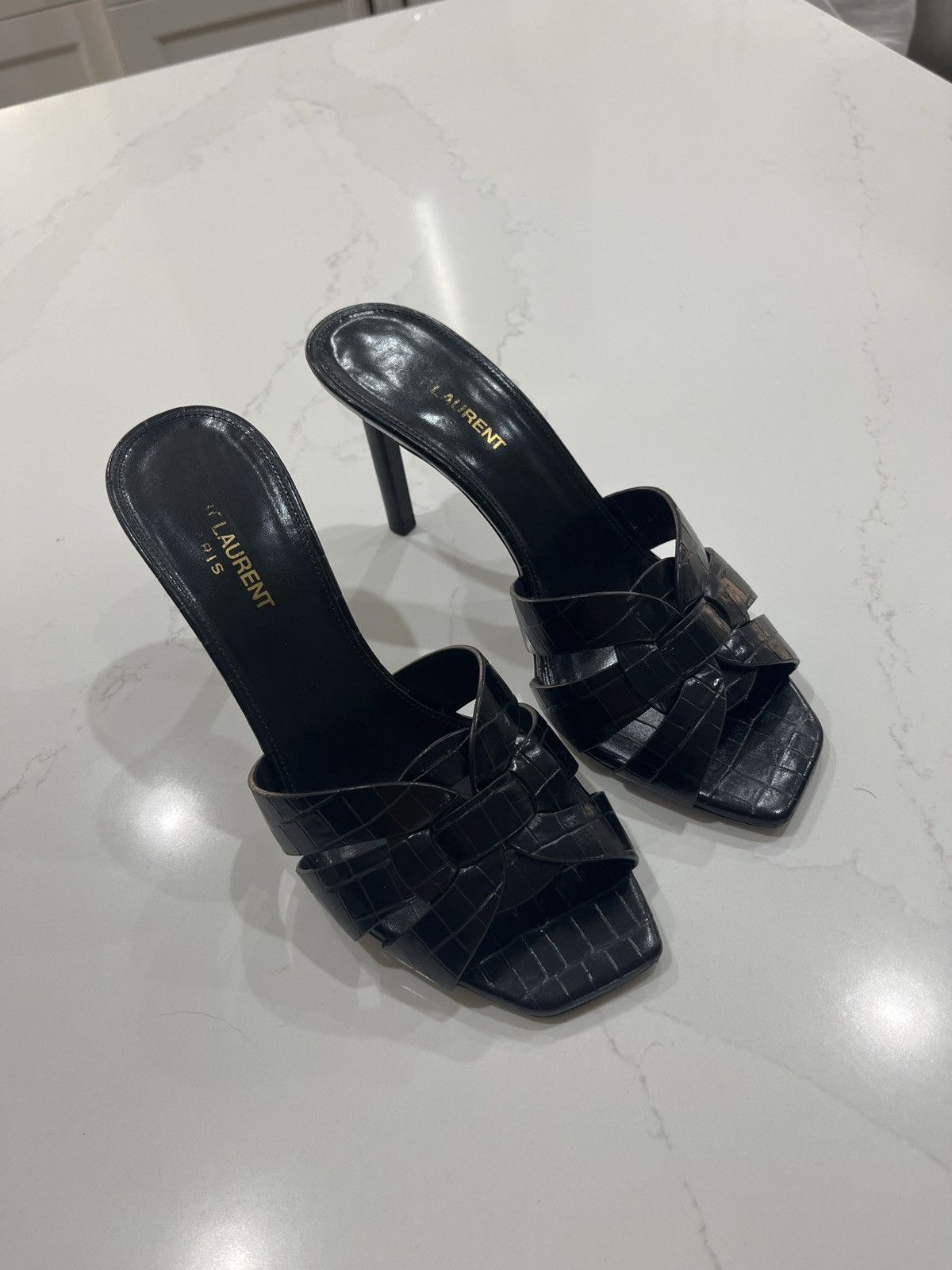 image of Saint Laurent Paris Tribute Mule Shoess In Crocodile-Embossed Shiny Leather Shoes in Black, Women's