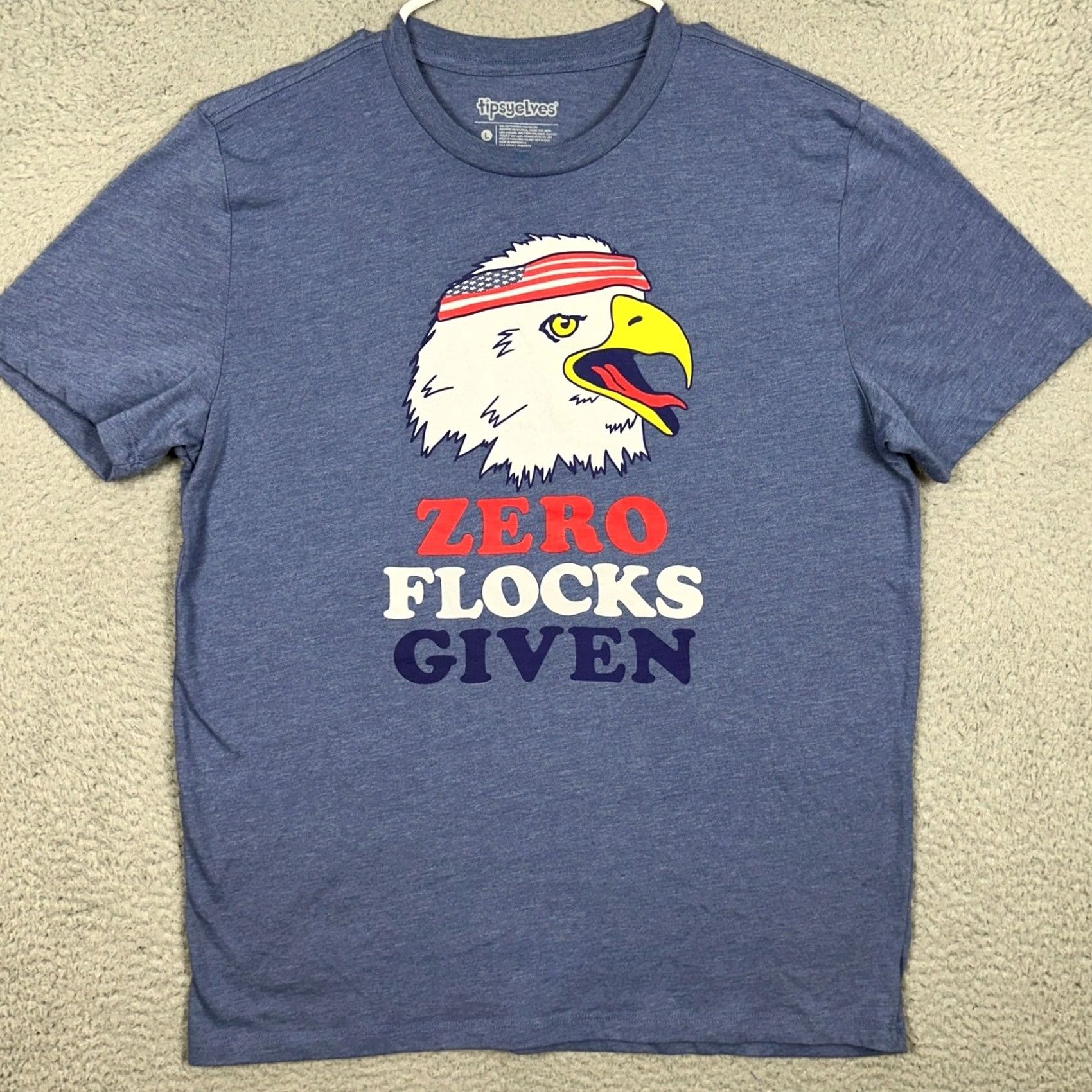 Vintage Tipsy Elves T-Shirt Mens L Blue Graphic Tee Eagle Zero Flocks Given Graphic Print Crew Neck Short Sleeve Patriotic Funny Animals EUC Size US L / EU 52-54 / 3 - 3 Thumbnail