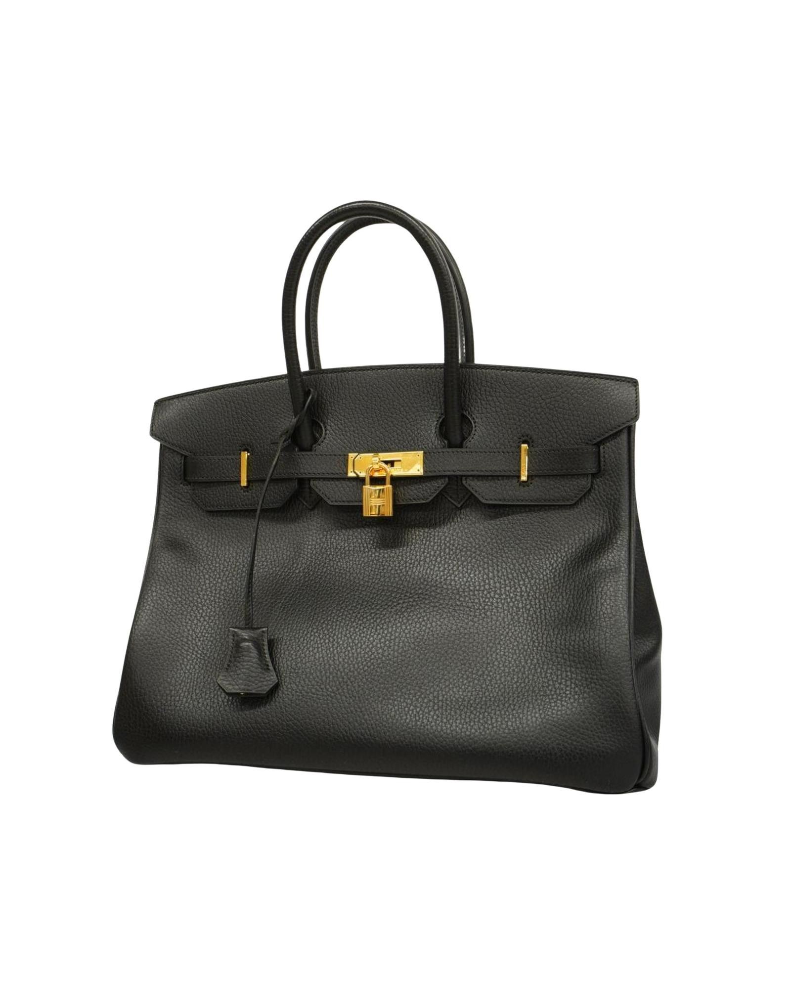 image of Hermes Sophisticated Black Leather Handbag With Gold Hardware - Good Condition, Women's