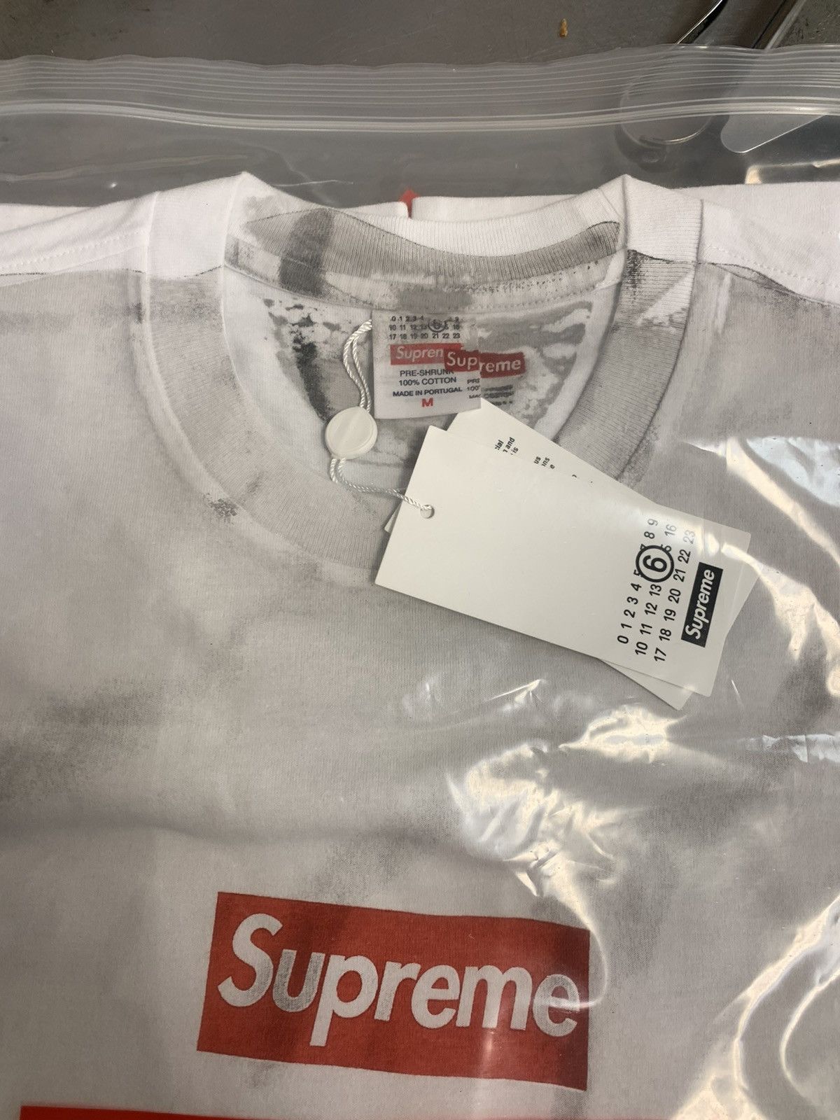 Supreme Supreme MM6 Maison Margiela Box Logo Tee White in hand