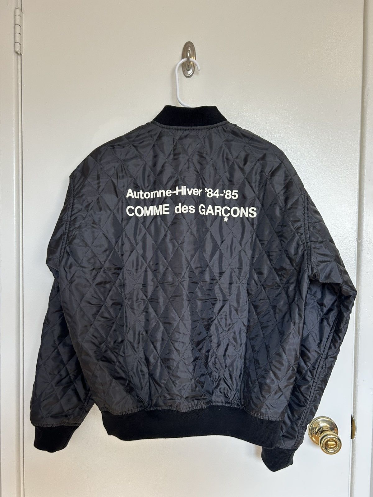 Cdg jacket price on sale