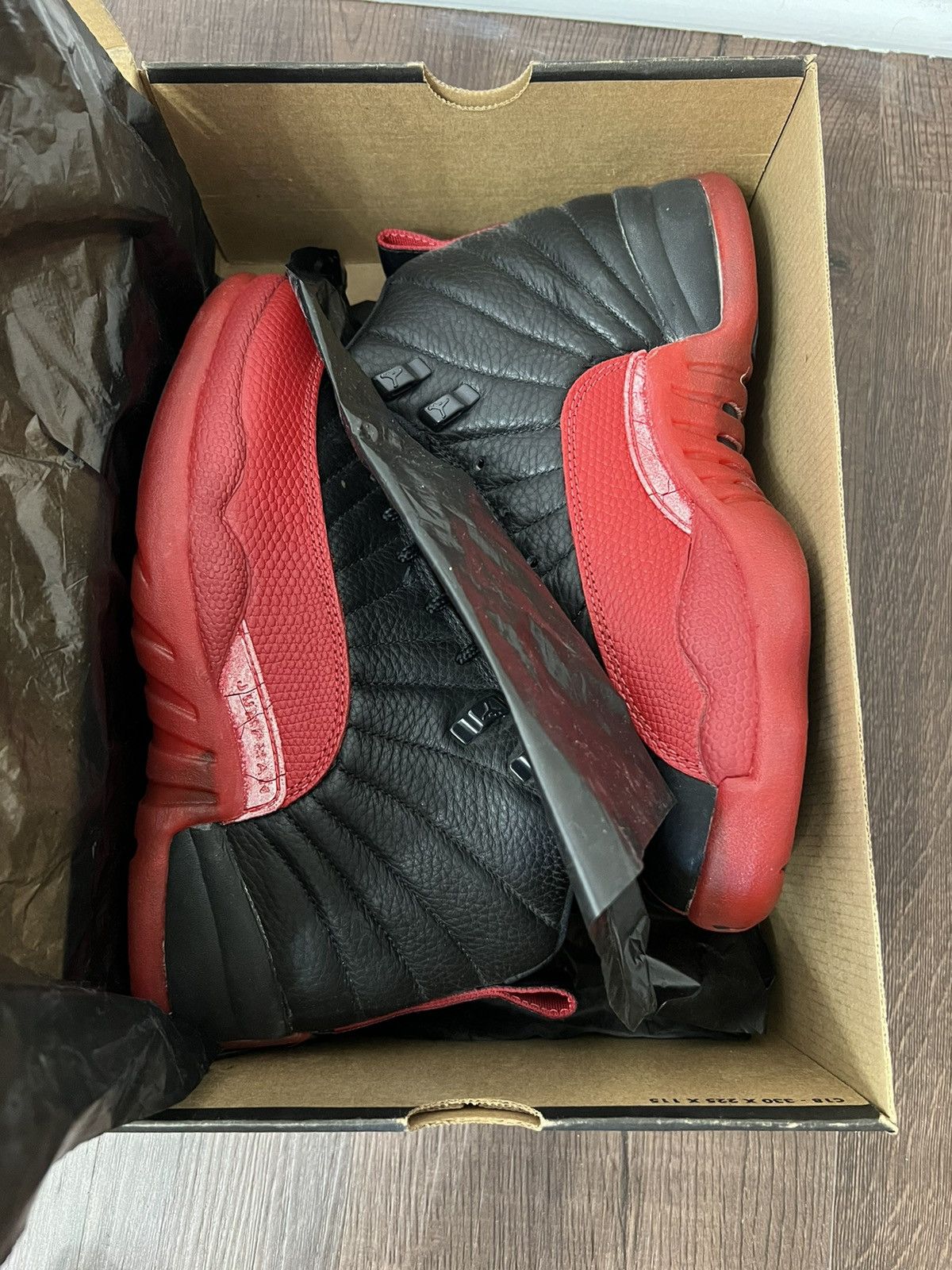 image of Jordan Brand 12 Flu Game/ Bred OG 1997 Shoes in Black/Red, Men's (Size 8)