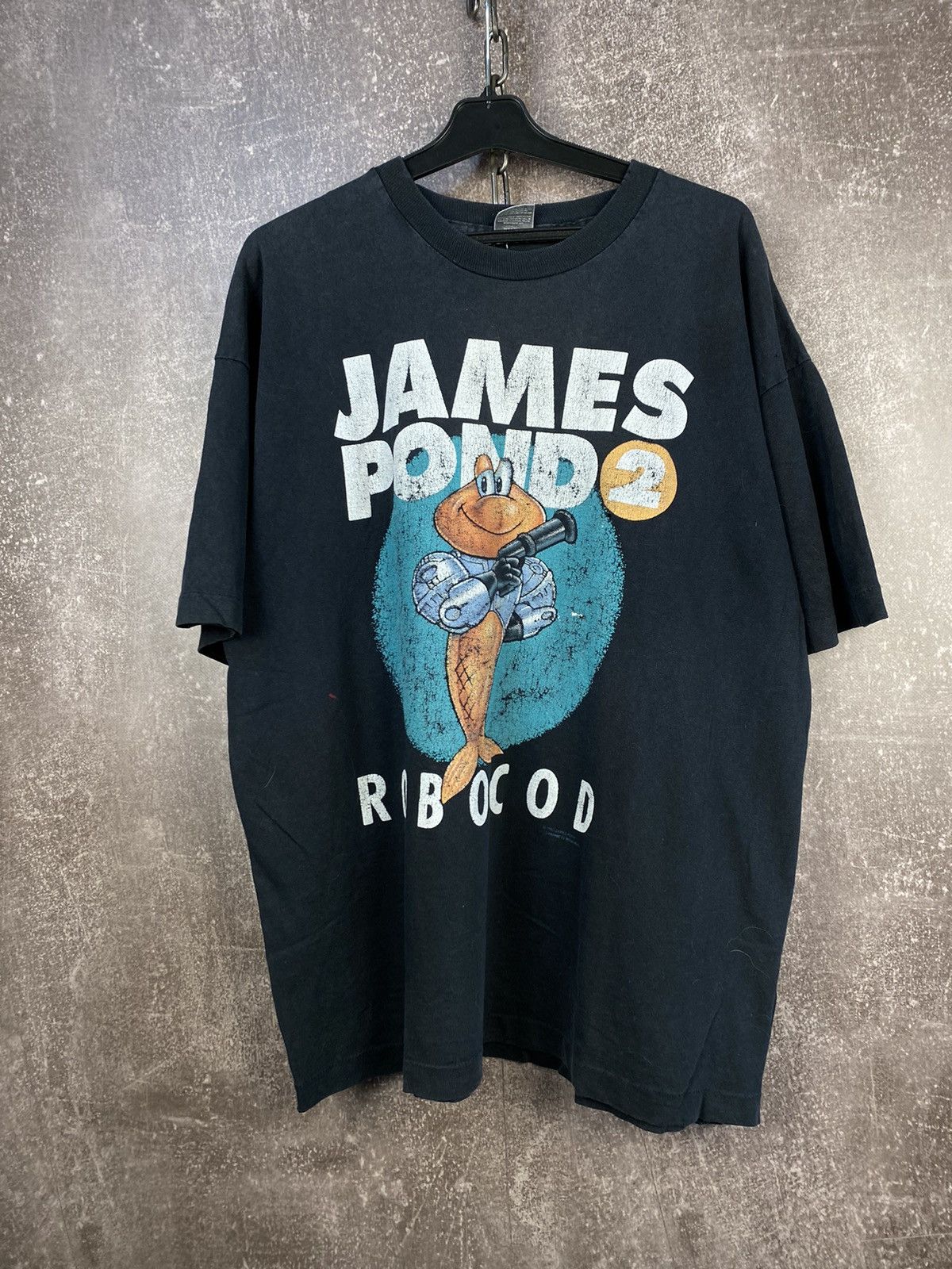 Vintage Vintage James Pond 2 Robocod shirt 1993 Loony Tunes Size US XL / EU 56 / 4 - 1 Thumbnail