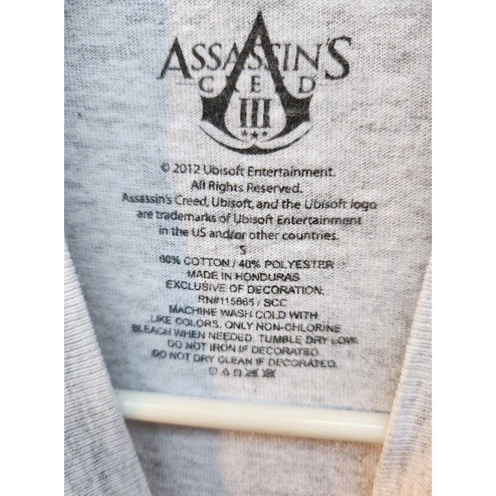Vintage Ubisoft Assassin's Creed III 2012 Gray Graphic Video Game Promo Tshirt Size S Mens T-Shirt Logo Crew Neck Short Sleeve Cotton Regular Fit Size US S / EU 44-46 / 1 - 3 Thumbnail