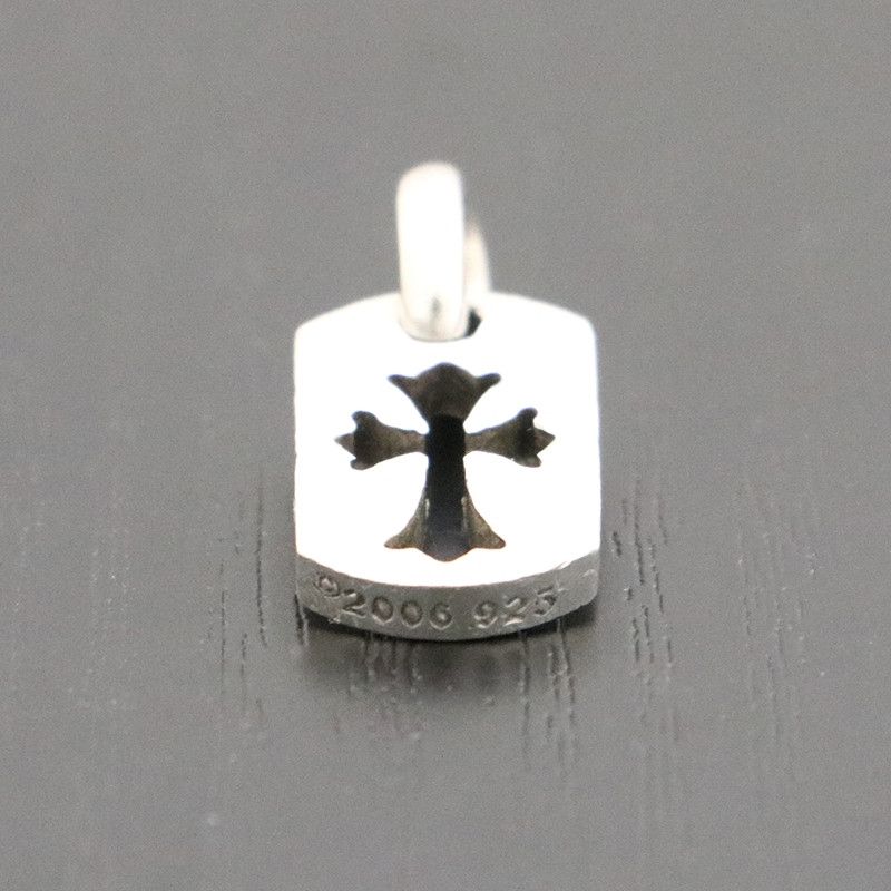 Chrome Hearts Chrome Hearts Cutout Cross Dog Tag | Grailed