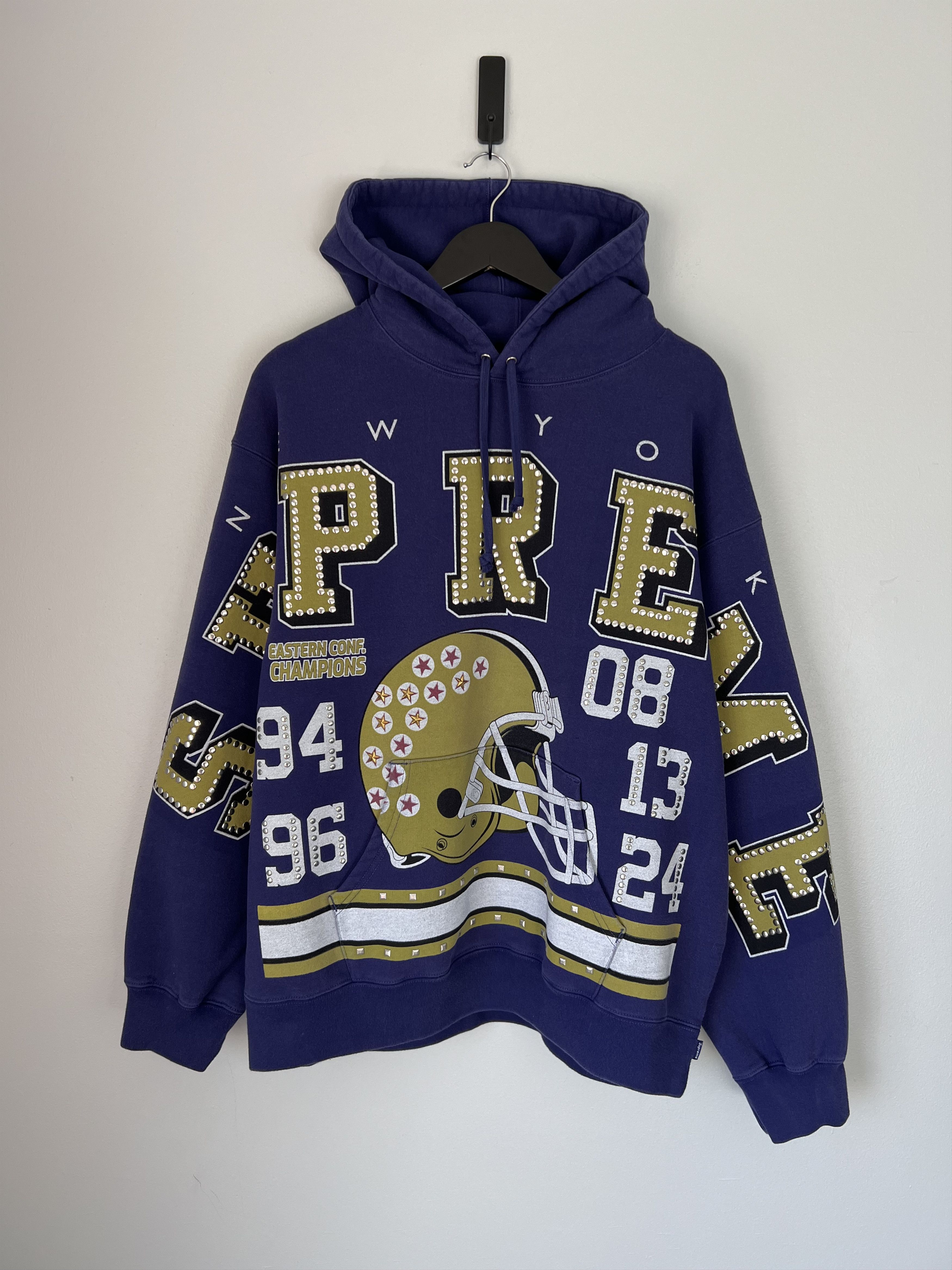 Supreme Supreme champions studded hooded sweatshirt | Grailed