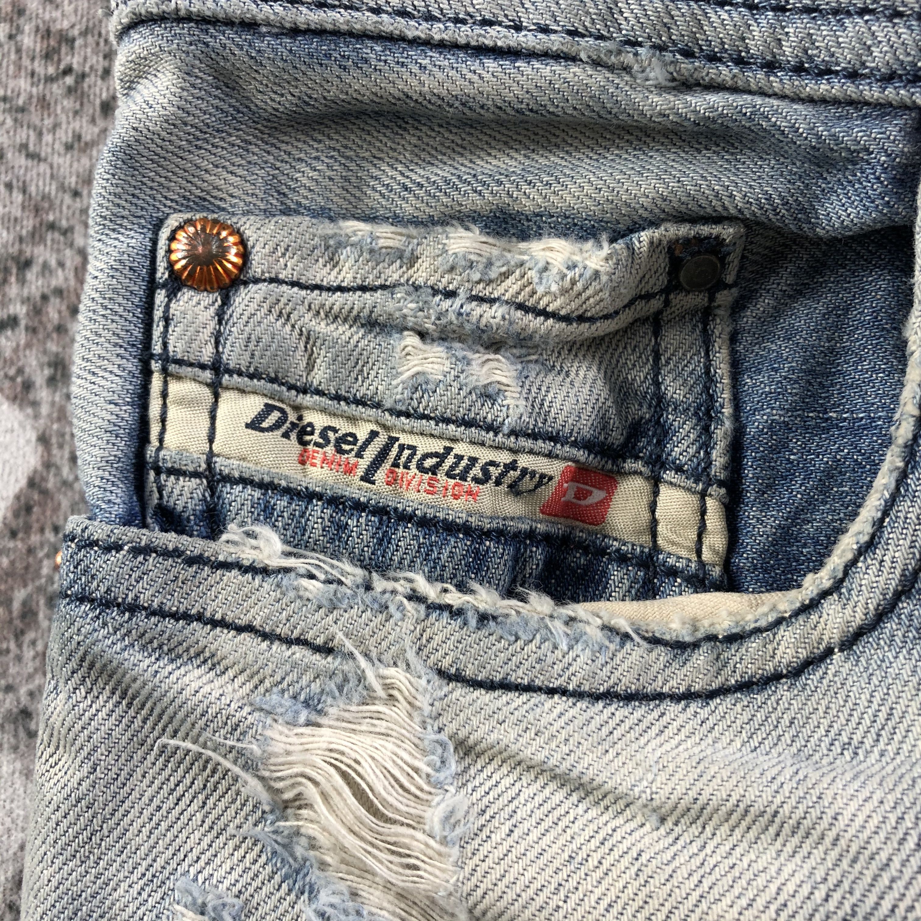 Diesel Ripped Jeans Faded Blue Denim KJ2885