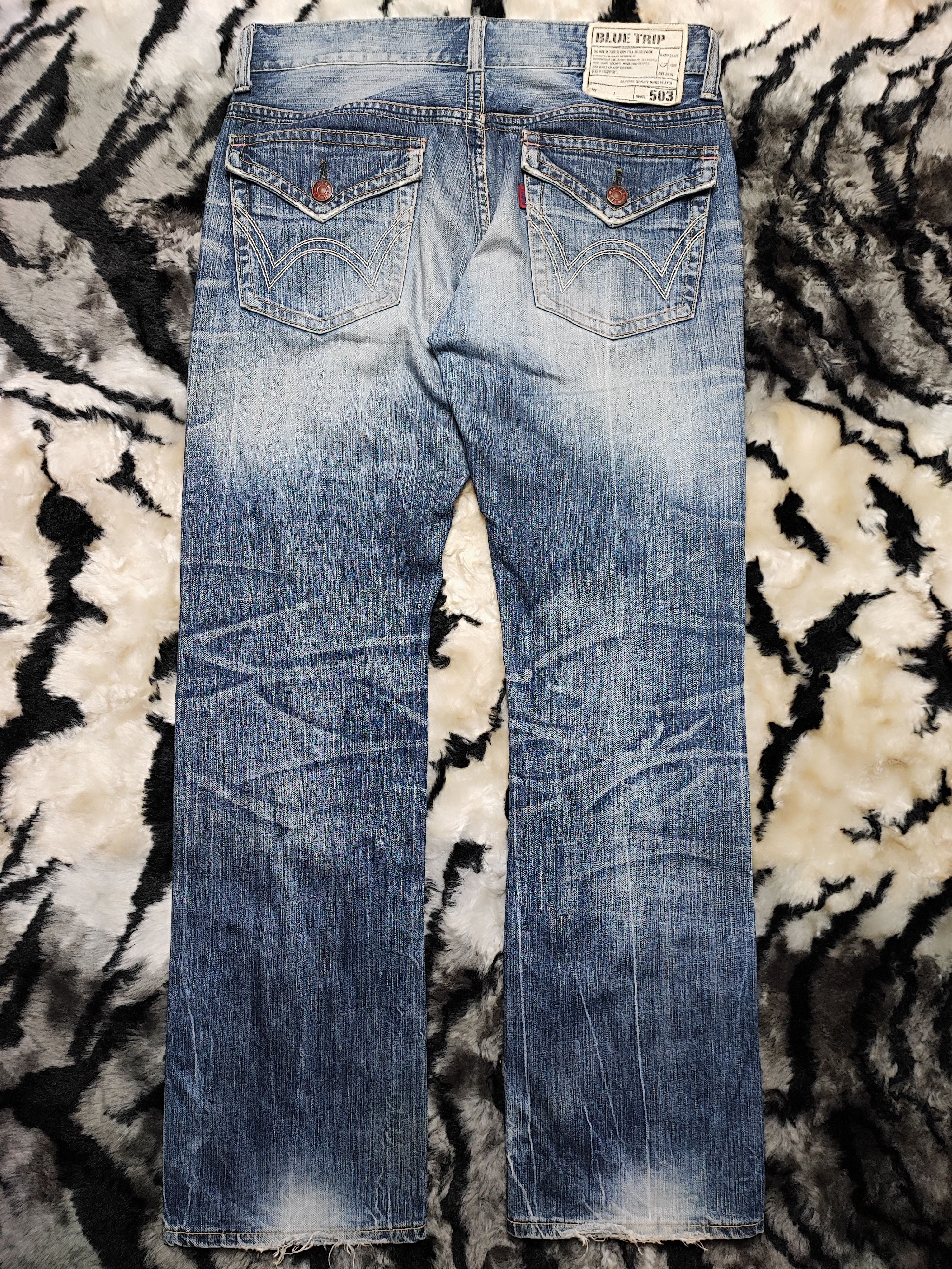 Vintage Edwin 503 Blue Trip Twisted Leg Distressed Jeans 34