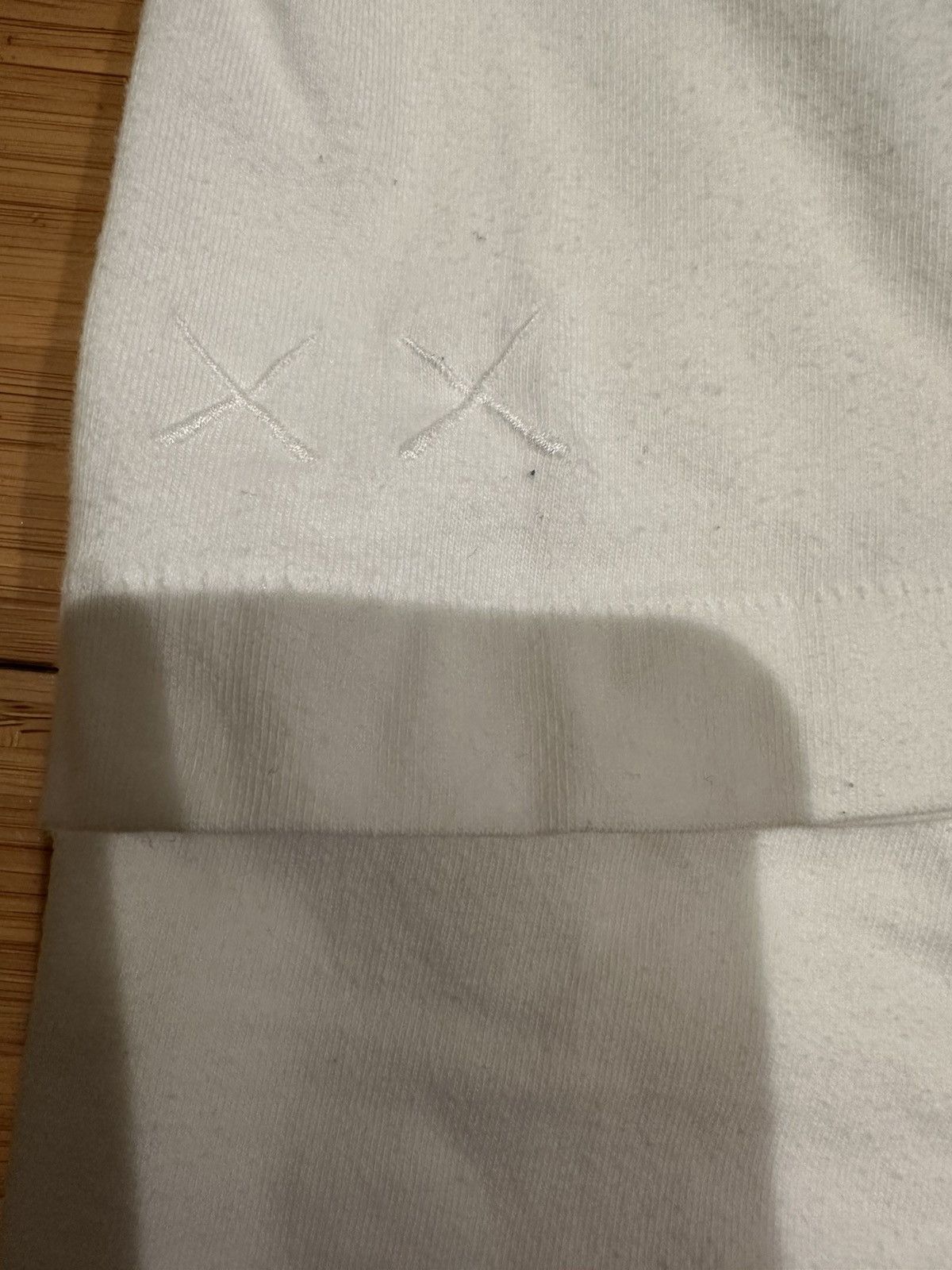 Kaws Kaws Uniqlo BFF Pocket Tee White Size Medium Size US M / EU 48-50 / 2 - 8 Thumbnail