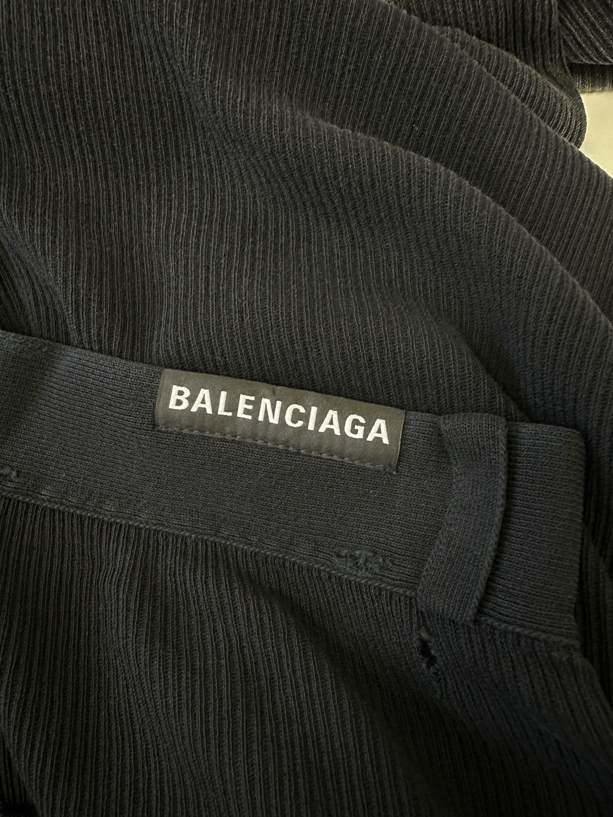 Distressed-effect trousers