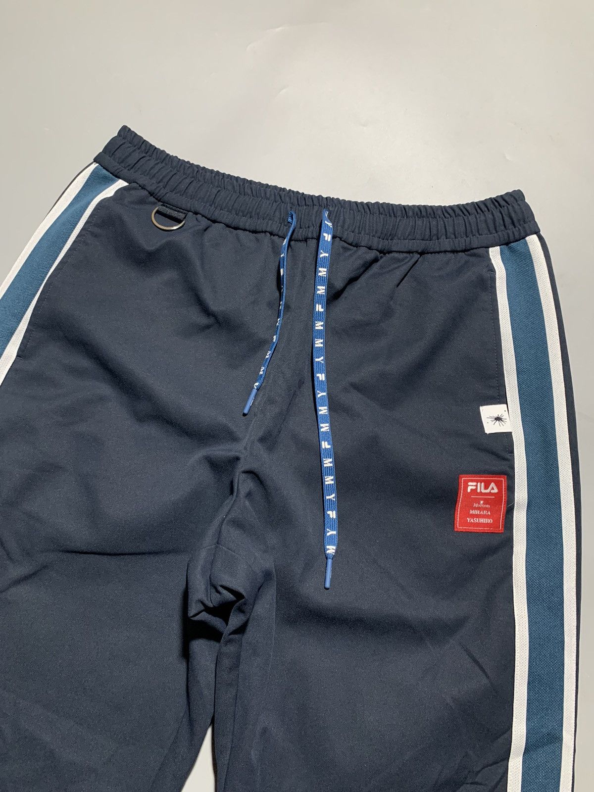 Fila × Maison MIHARA YASUHIRO FILA X MMY SIDE STRIPE WOVEN TRACK PANTS Size US 30 / EU 46 - 2 Thumbnail