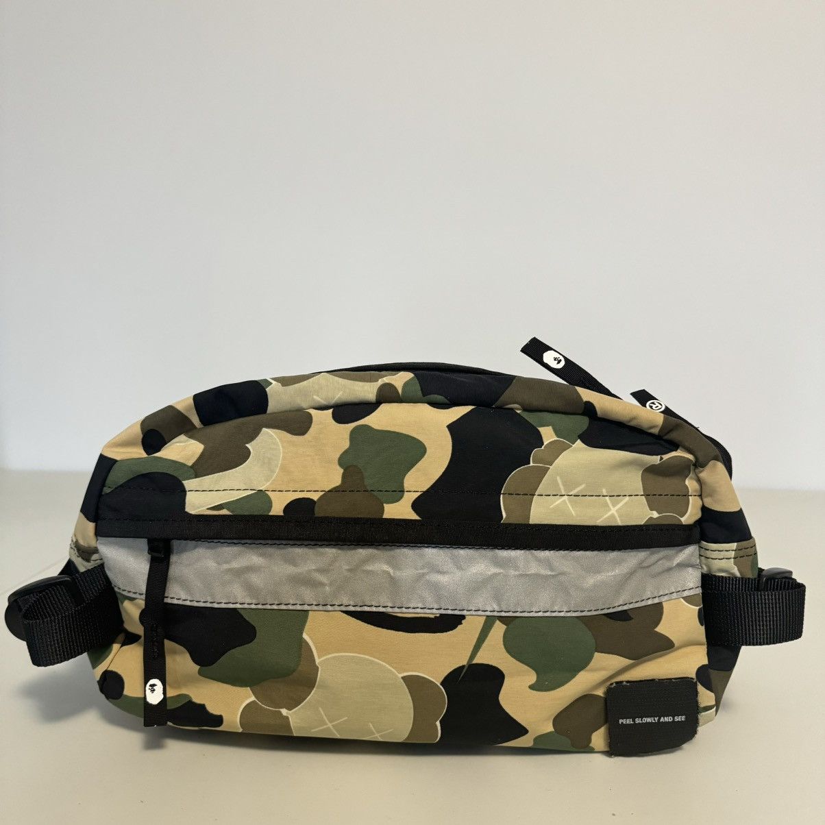 Bape × Kaws Bape x Kaws Bendy Camo Cross Body Waist Bag Size ONE SIZE - 1 Thumbnail
