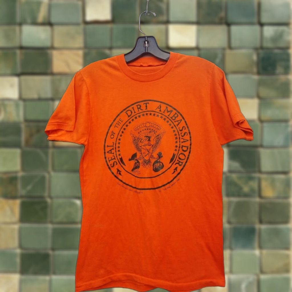 Vintage VINTAGE DIRT CLUB UNDERGROUND PUNK NEW JERSEY 1980s Screen Stars 50/50 M Shirt Mens Orange Graphic Tee Size US M / EU 48-50 / 2 - 1 Thumbnail