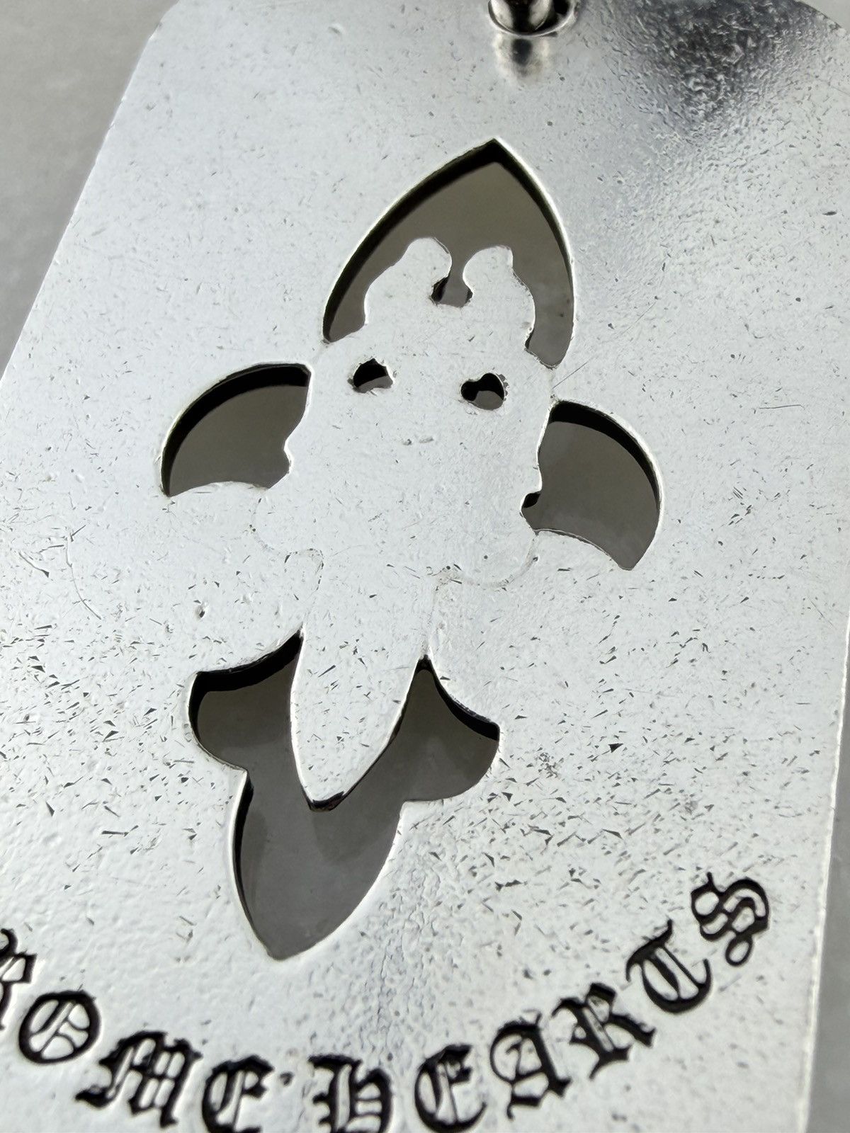 Chrome Hearts CHROME HEARTS FLEUR CUT OUT DAGGER DOG TAG | Grailed