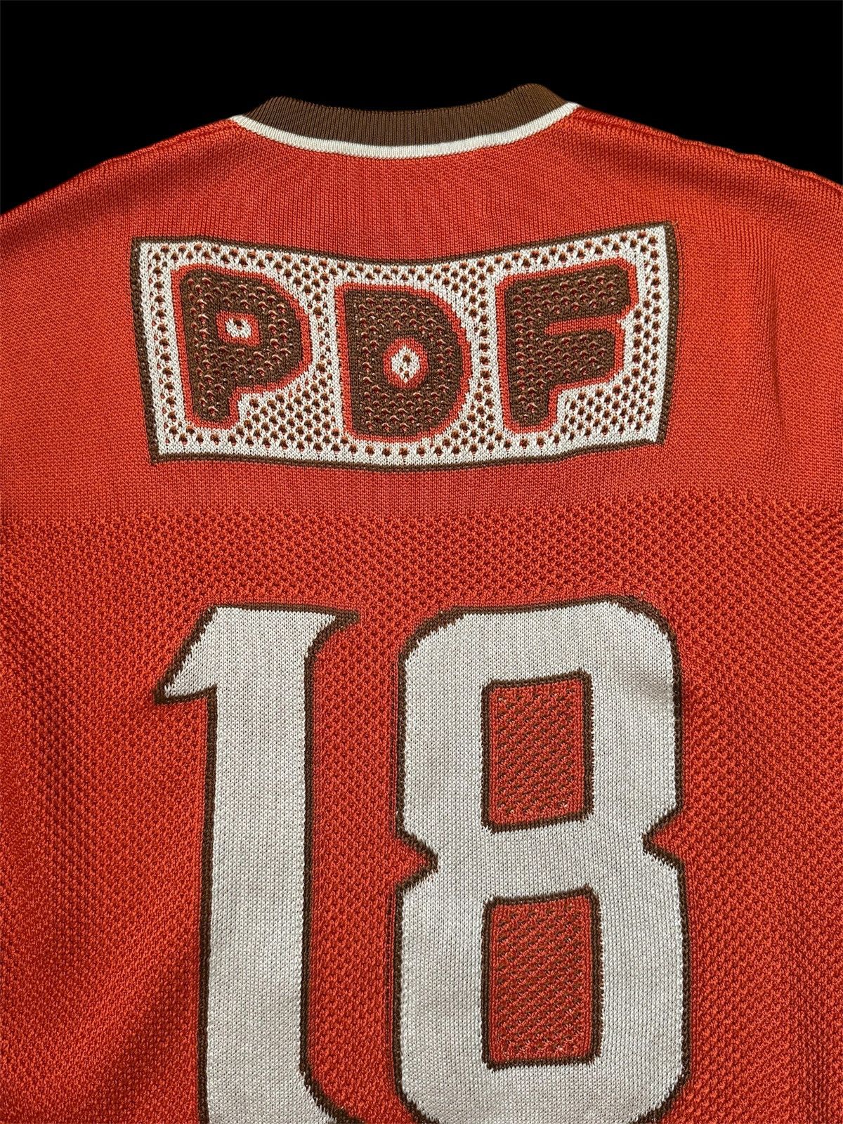 PDF PDF Channel Football K000 Orange jersey Size US XS / EU 42 / 0 - 2 Thumbnail
