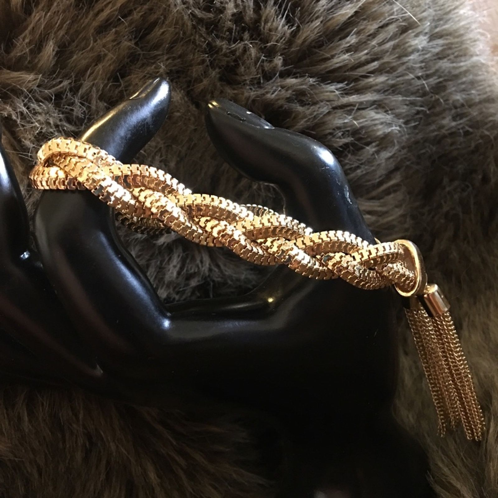 Jewelry Gold tone braided chain bracelet with tassel Size ONE SIZE - 1 Thumbnail