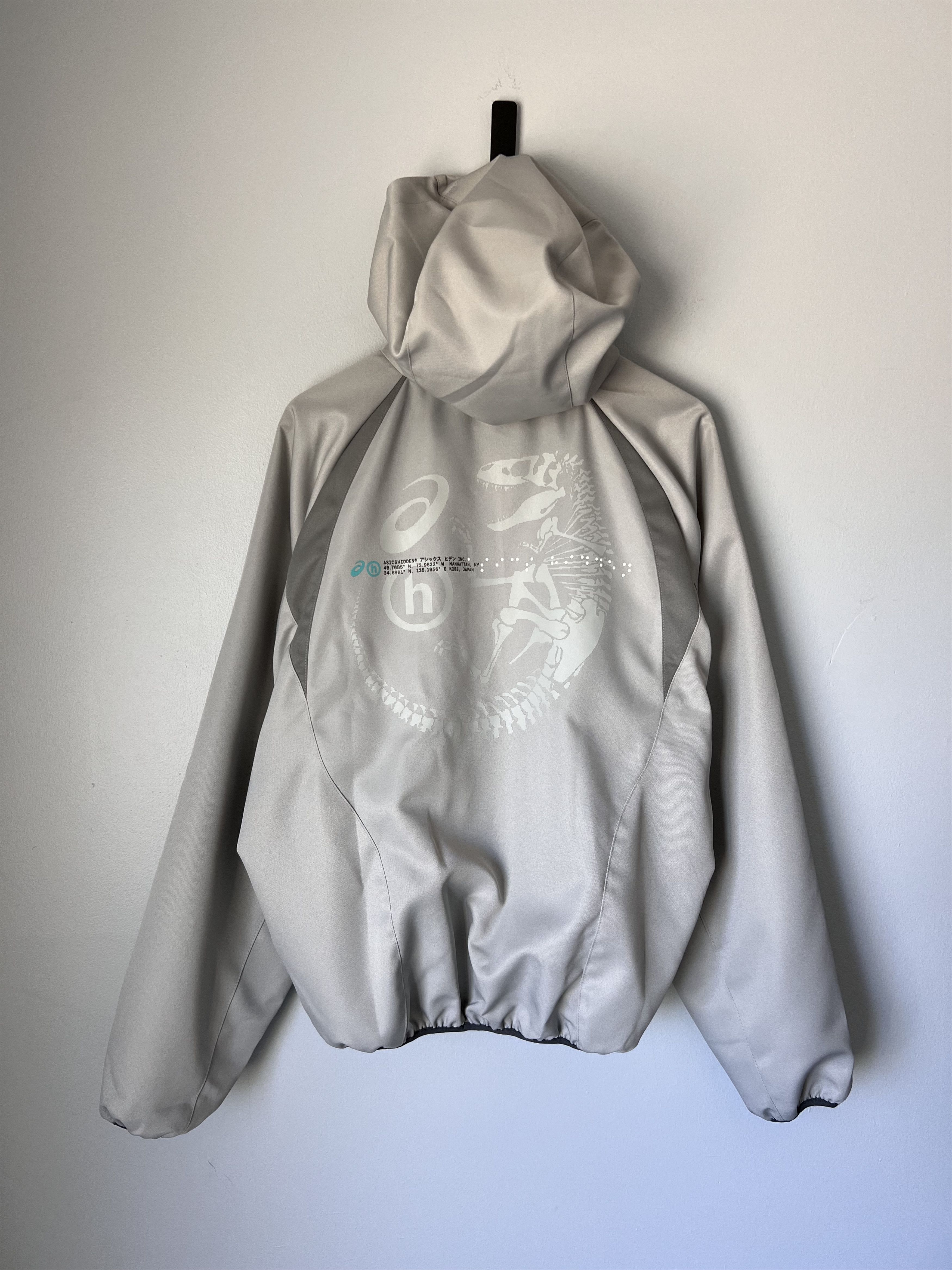 Asics Hidden NY Shield Track Jacket in Grey