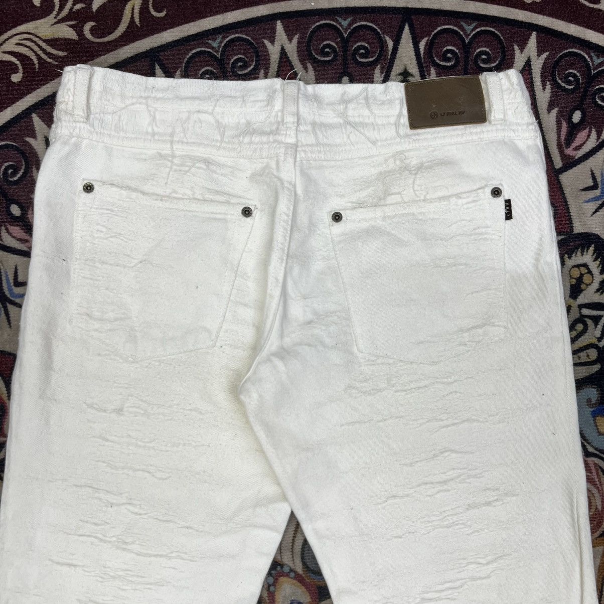L7 Real Hip L7 REAL HIP DISTINCTIVE RIP AND REPAIR DESIGN FLARE JEANS Size US 32 / EU 48 - 12 Thumbnail