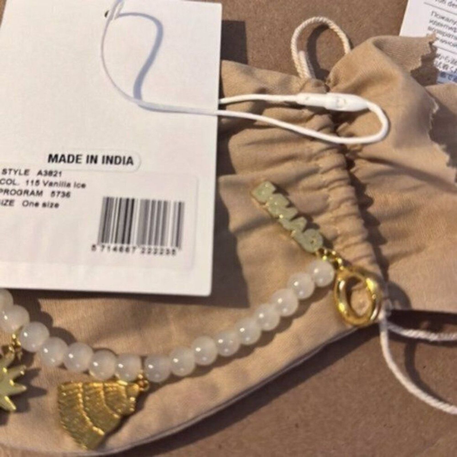 Ganni Ganni White beaded bracelet with gold charms Size ONE SIZE - 8 Thumbnail