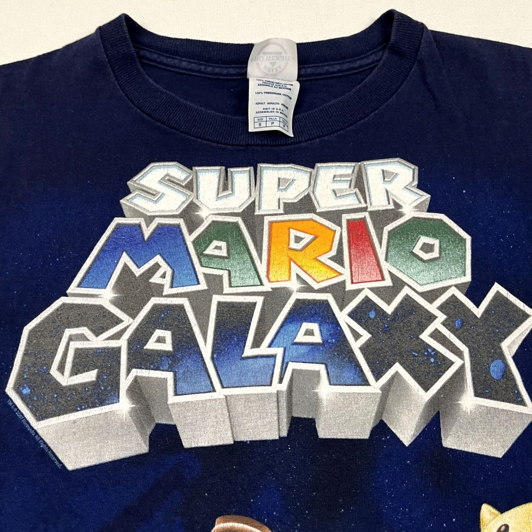 Delta New title: 2007 Super Mario Galaxy Shirt Men S Blue Nintendo Wii Video Game Promo Graphic Size US S / EU 44-46 / 1 - 3 Thumbnail
