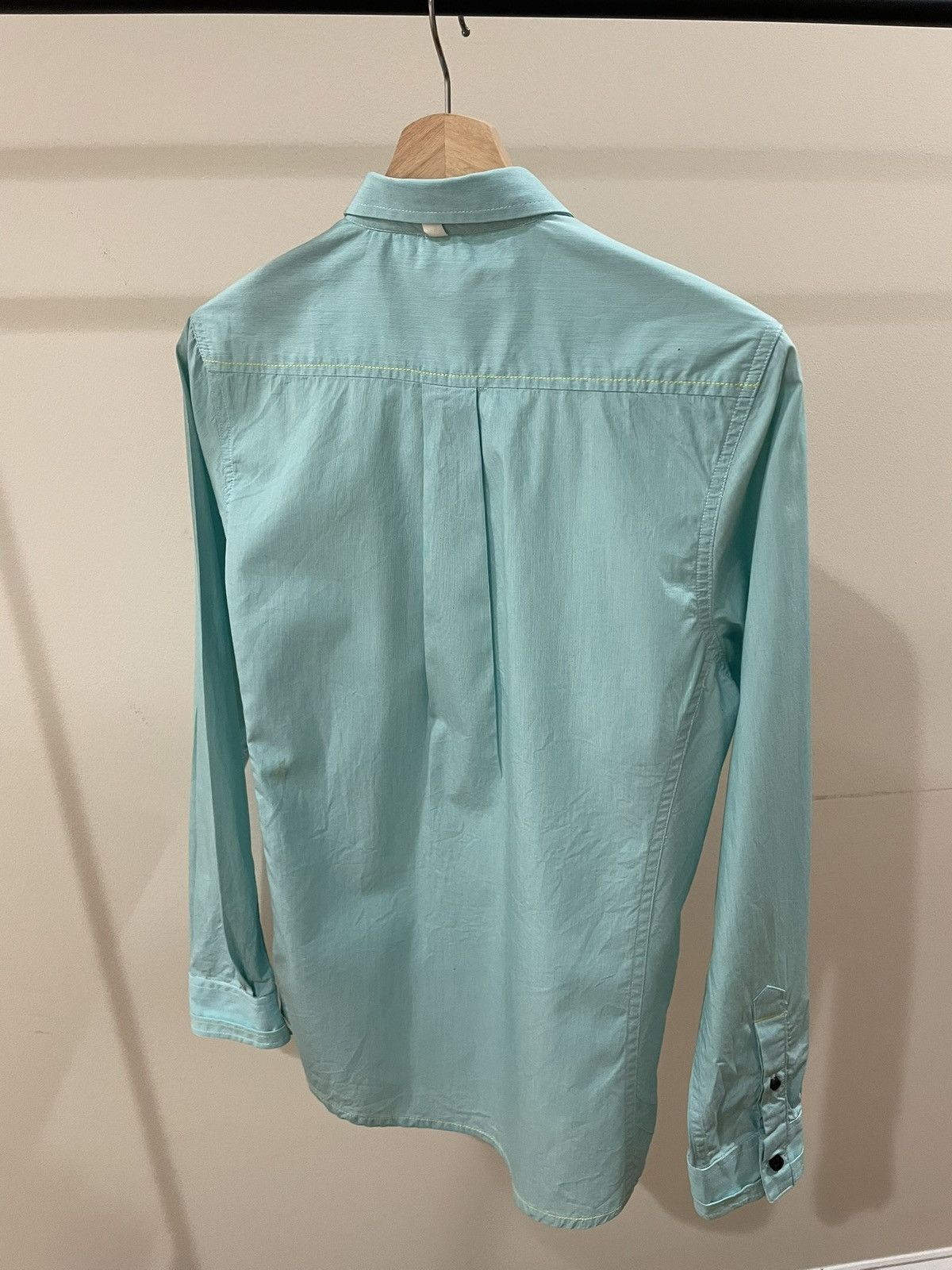 Descendant of Thieves Turquoise button-up with black buttons Size US S / EU 44-46 / 1 - 2 Thumbnail