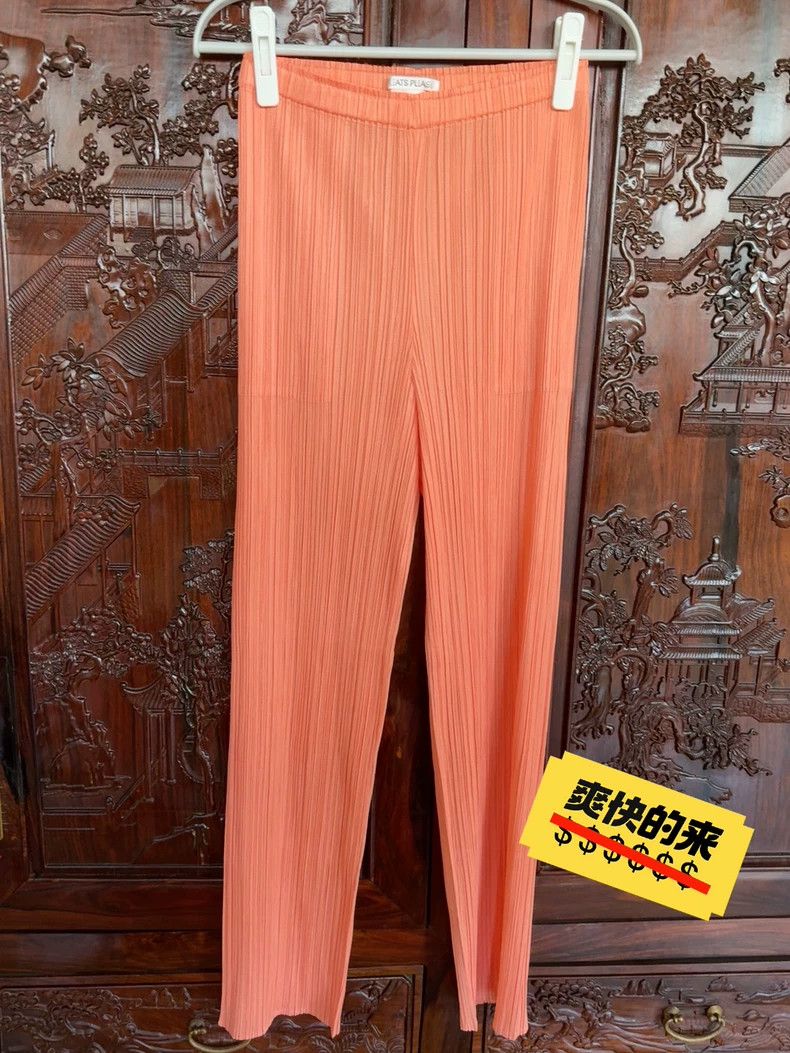 Issey Miyake Issey Miyake size:5 Light orange pleated trousers Size 22" - 1 Thumbnail
