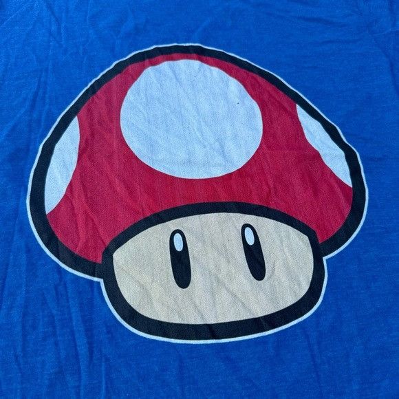 Nintendo NEW SUPER MARIO BROS NINTENDO MUSHROOMS BLUE T-SHIRT SZ MEDI Size US M / EU 48-50 / 2 - 3 Thumbnail
