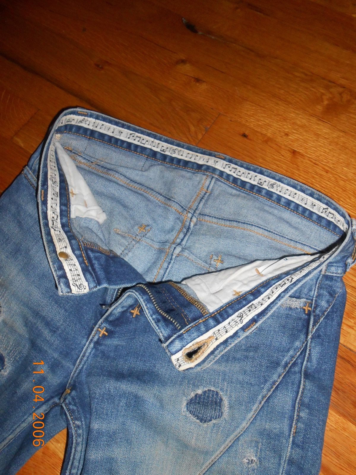 number (n)ine distressed repair denim