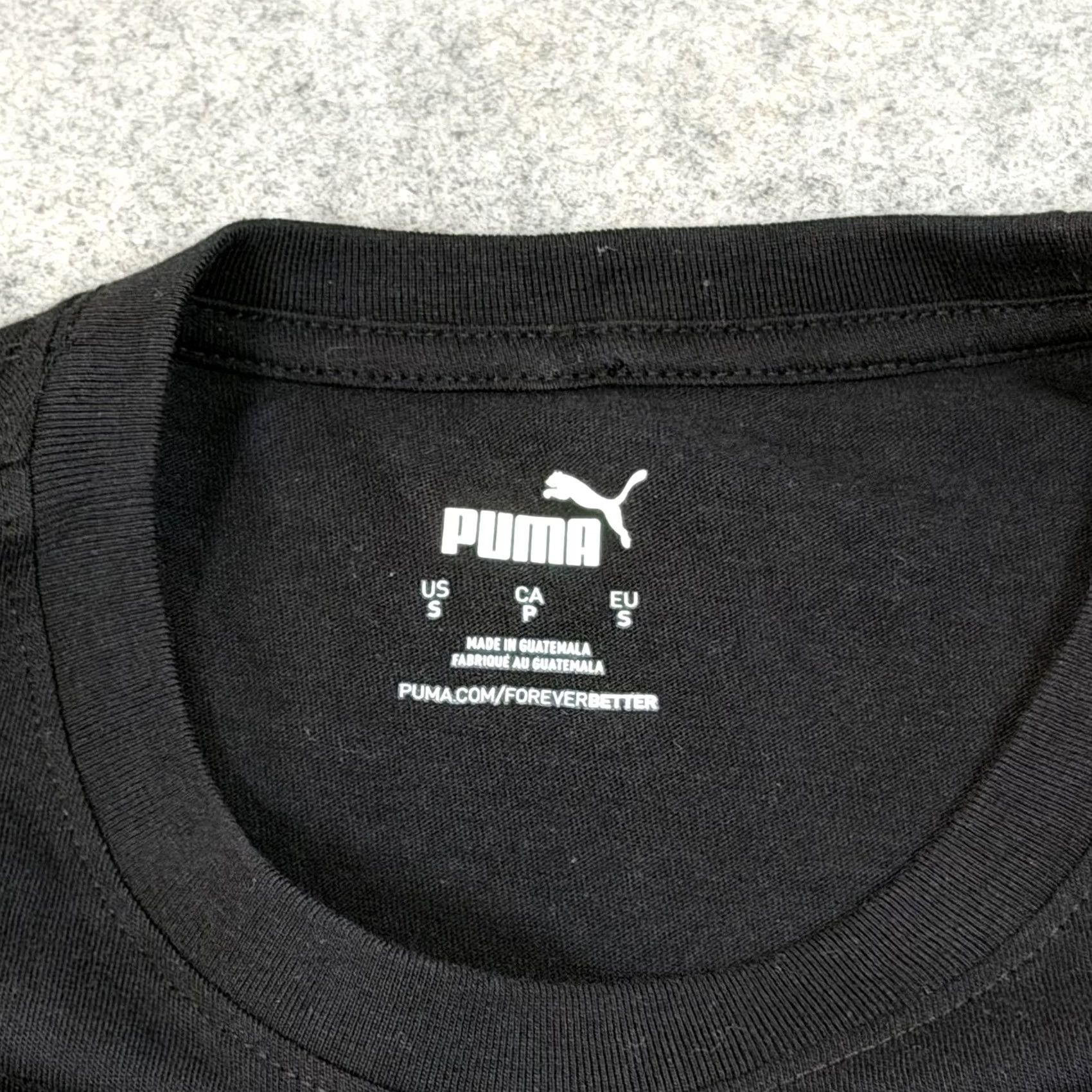 Puma Puma Soccer Shield Badge Sport Short Sleeve T-Shirt Mens Black Small Cotton Knit Shirt 38in Chest 28.5in Length Size US S / EU 44-46 / 1 - 3 Thumbnail