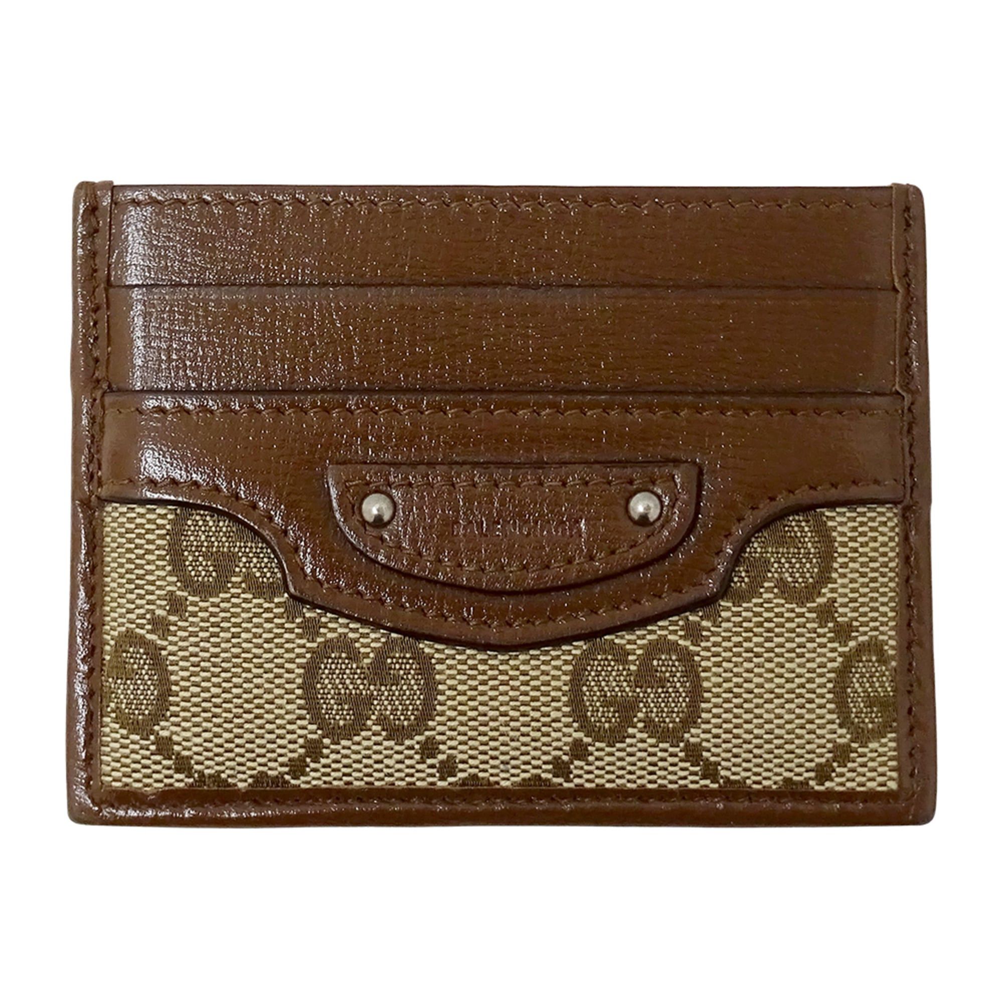 Gucci Gucci & Balenciaga collaboration business card holder/card case for women and men, featuring GG canvas leather in brown beige, item number 681709. Size ONE SIZE - 1 Thumbnail
