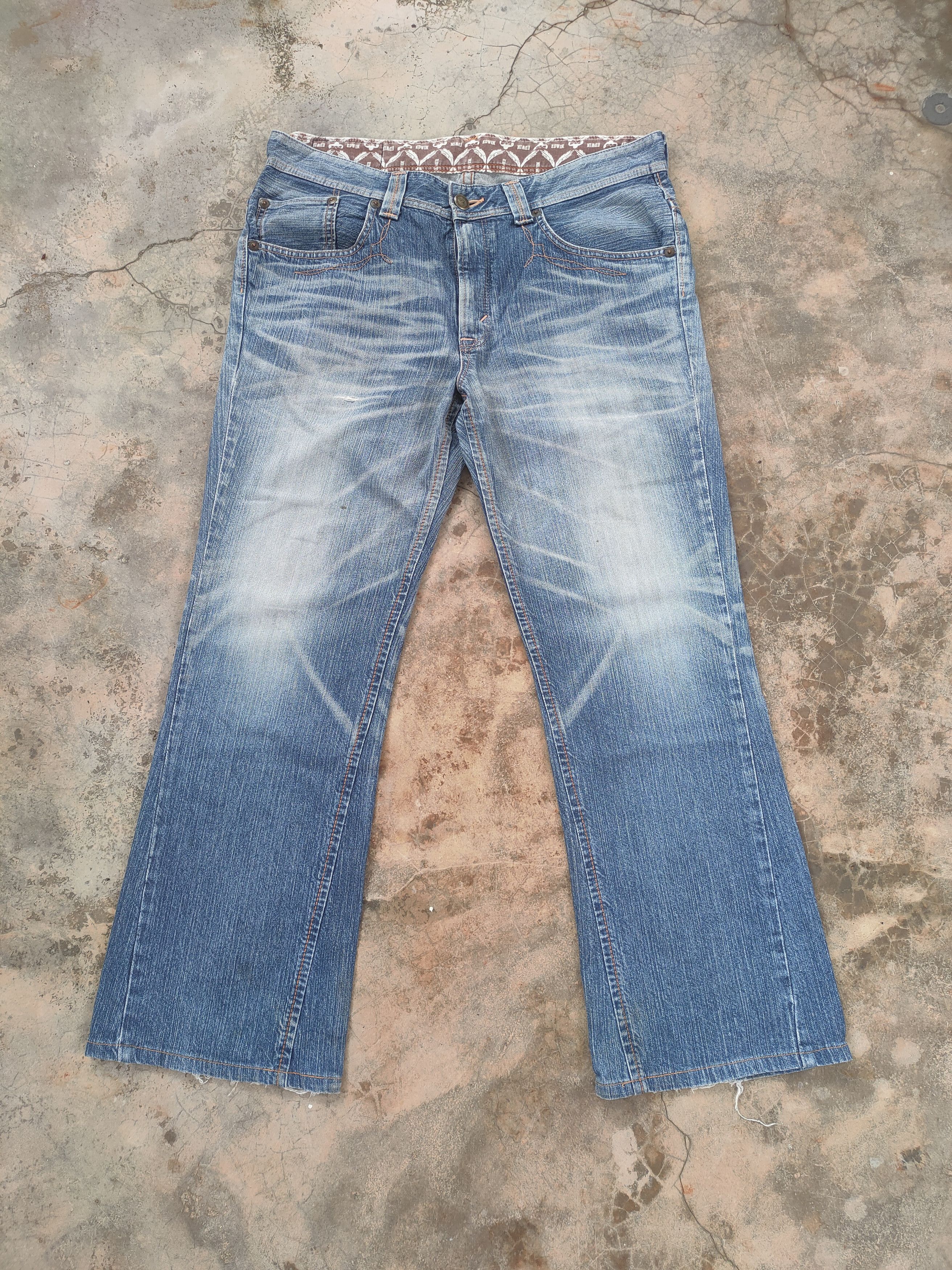 image of Vintage Edwin Faded Distressed Denim Jean Pants in Faded Blue, Men's (Size 38)