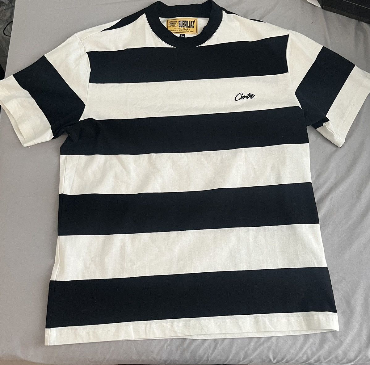 Corteiz Black/white stripped tee | Grailed