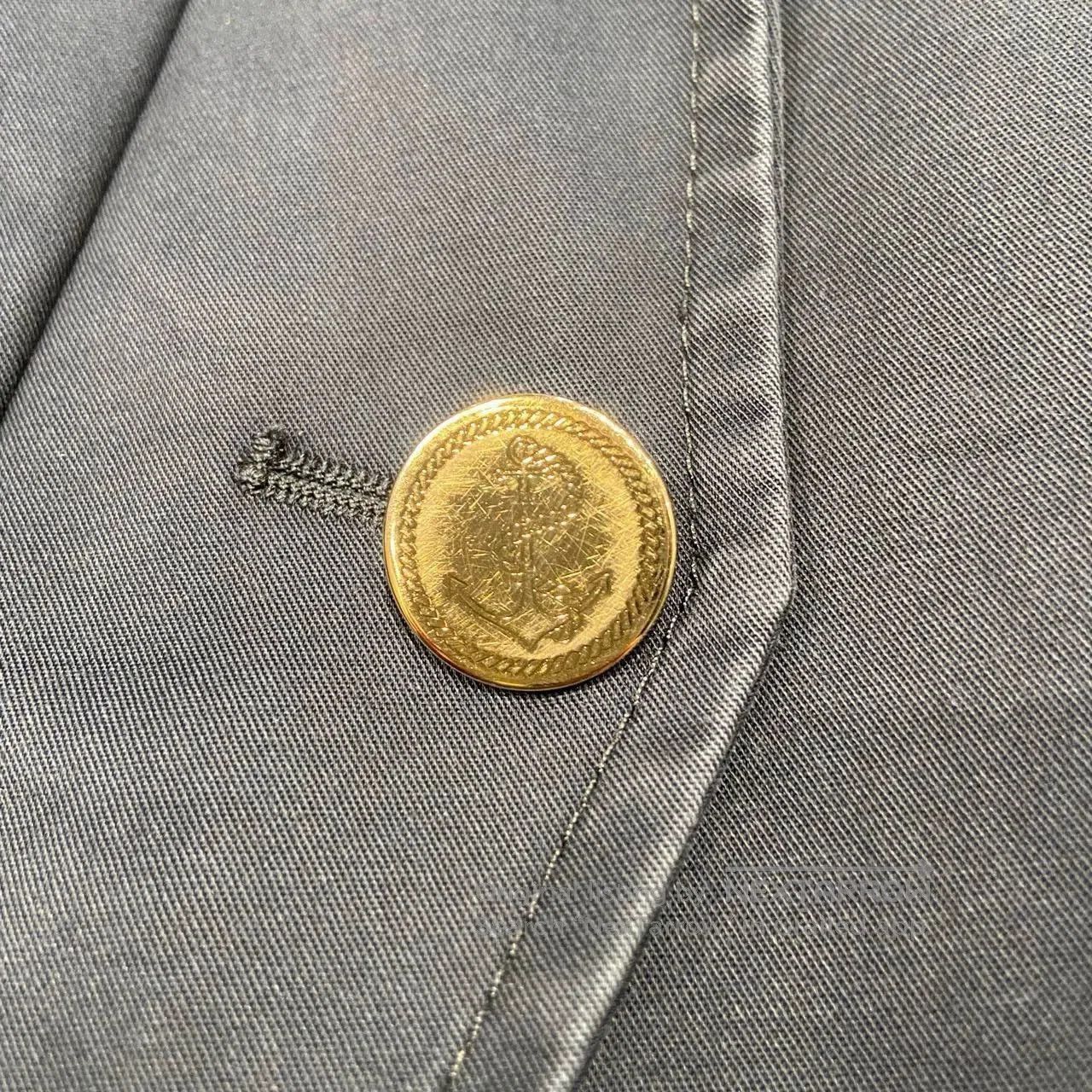 thom browne navy blue jacket with wear marks.