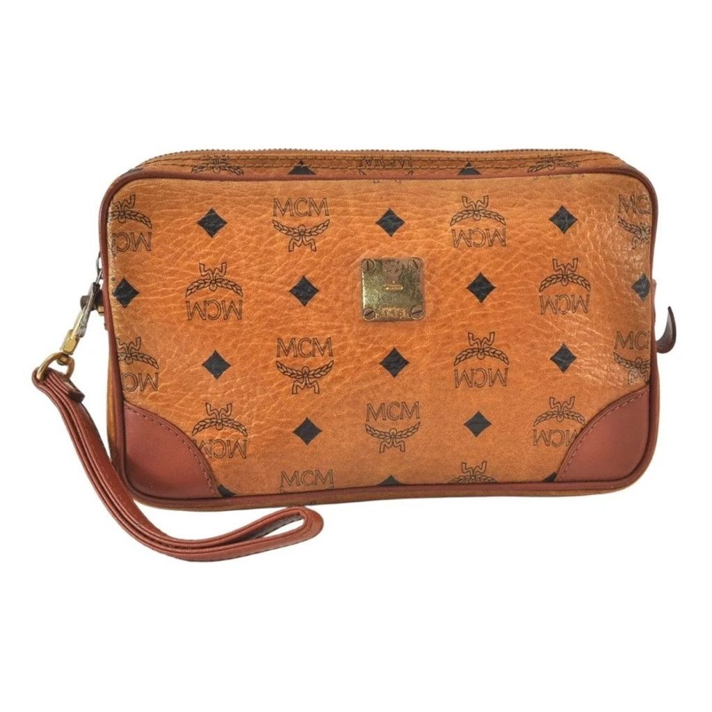 MCM MCM Brown Clutch with Logo Pattern and Wrist Strap Size ONE SIZE - 1 Thumbnail