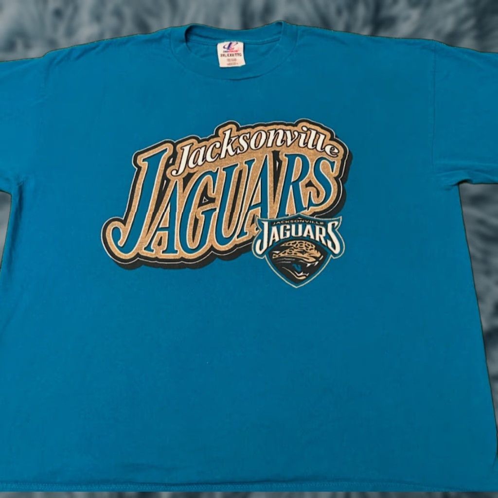 Logo Athletic VINTAGE Jacksonville Jaguars Classic Logo Spell Out VTG Shirt Mens XXL Blue 90s Sports Hip Hop T-Shirt Logo Athletic Short Sleeve Size US XXL / EU 58 / 5 - 1 Thumbnail