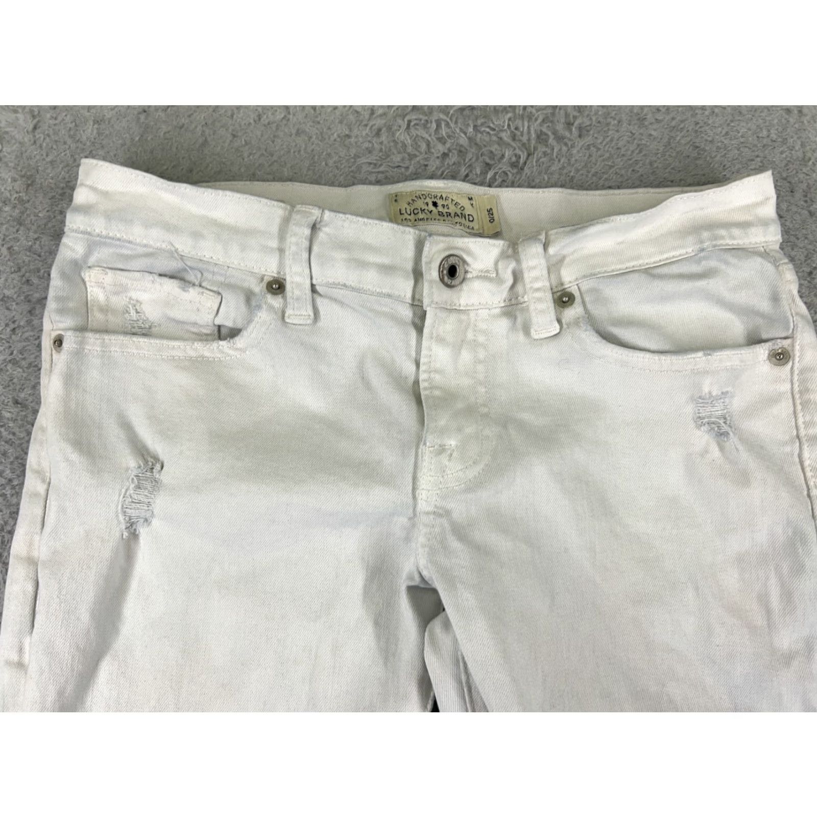 Denime VINTAGE? No, not vintage. Lucky Brand Jeans White Denim Slim Boyfriend Distressed 0 Women’s 27 Inseam 5-Pocket Zip Fly Medium Wash Cotton Blend Size 25" / US 0 / IT 36 - 4 Thumbnail